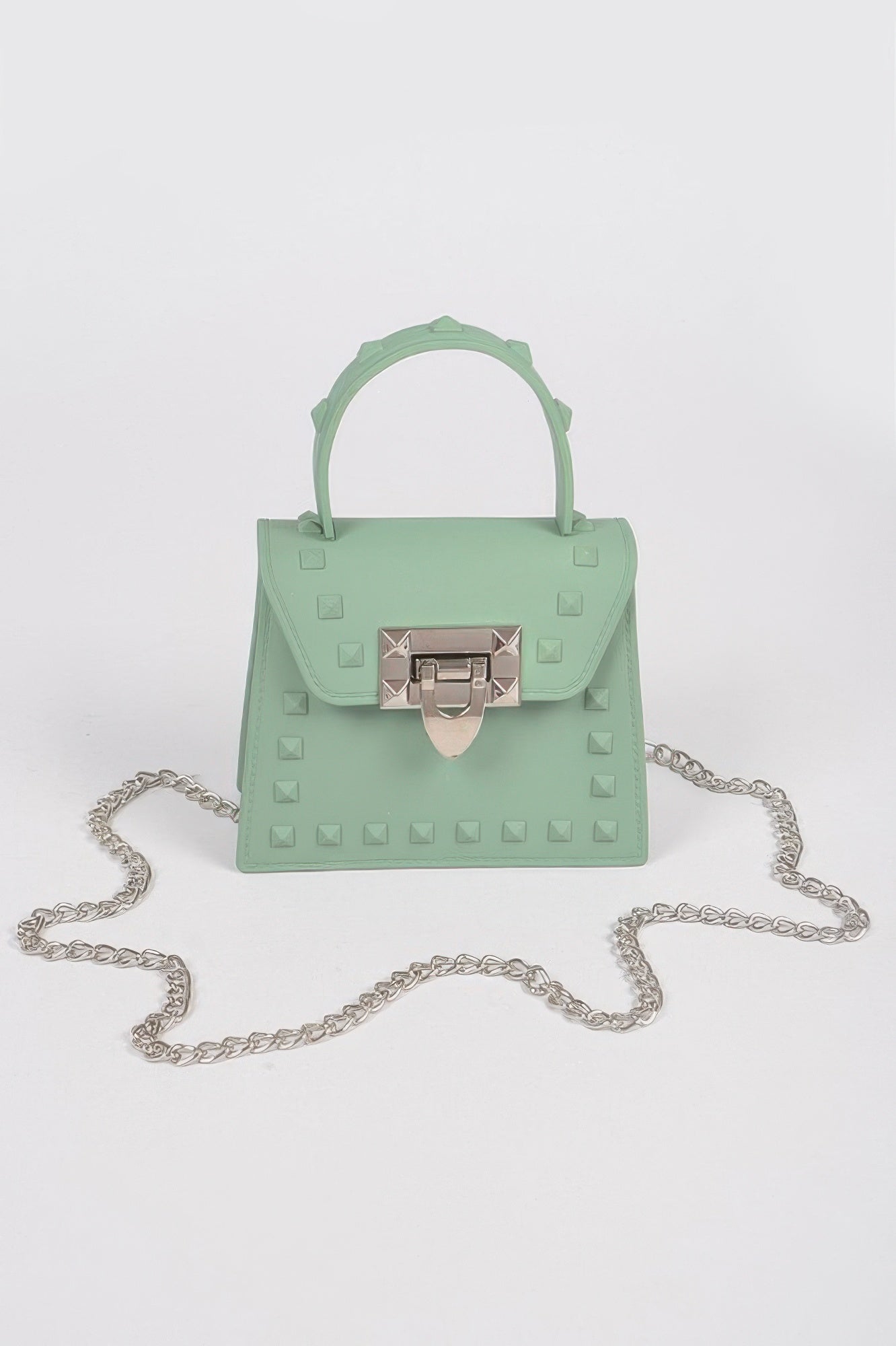 Jelly mini handbag in mint green with top handle, chain strap, studded front and clasp