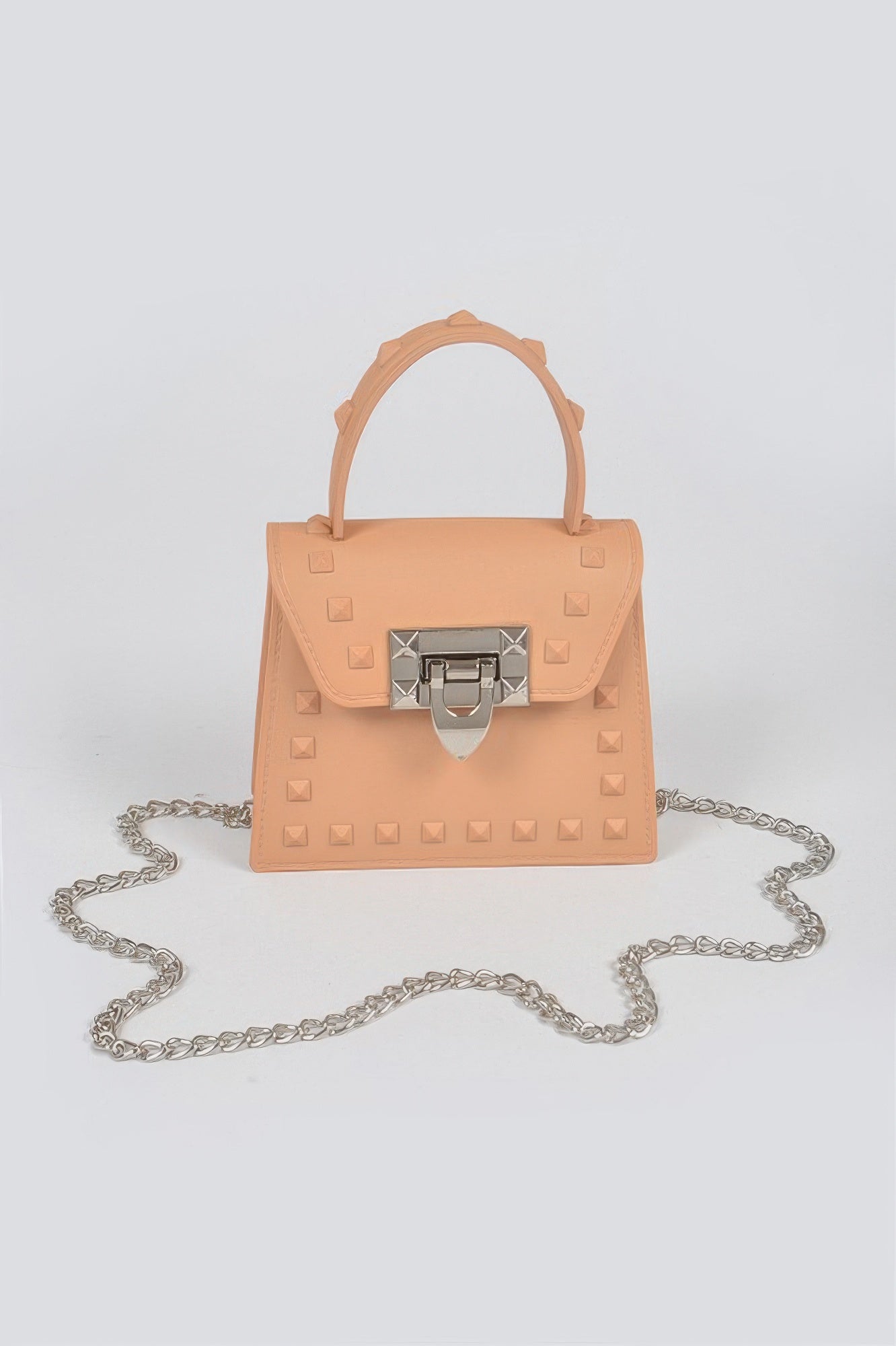 Jelly mini handbag in nude with top handle, chain strap, studded front and clasp