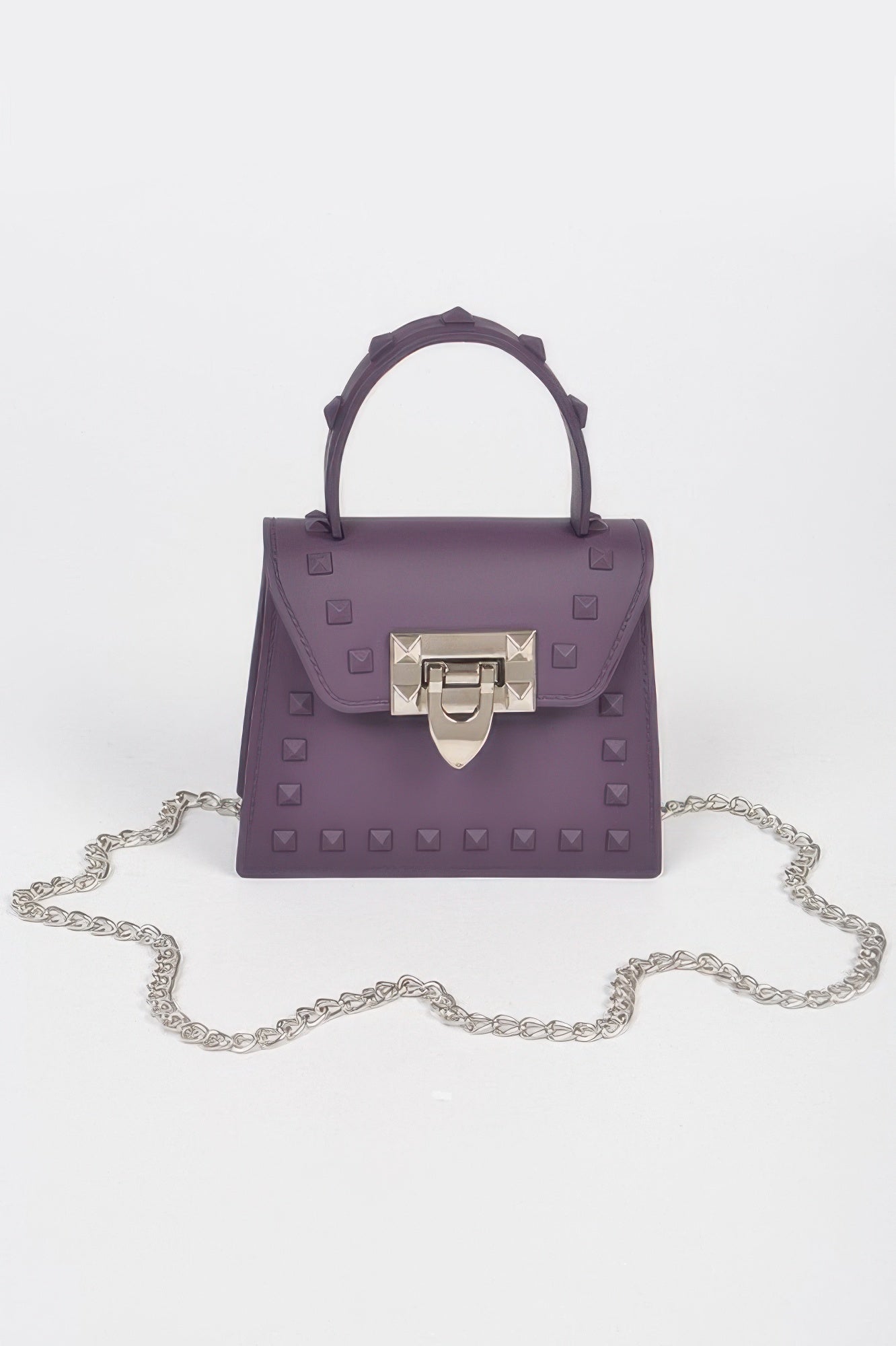 Jelly mini handbag in purple with top handle, chain strap, studded front and clasp