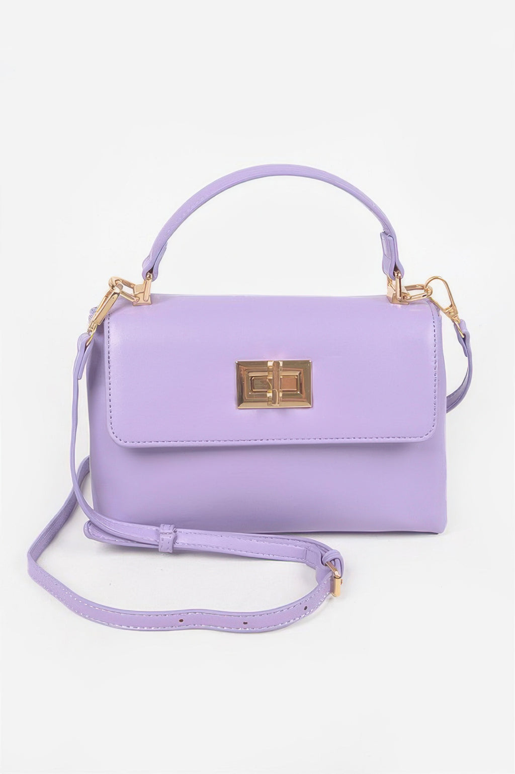 Purple faux leather flap bag with gold square clasp and shoulder strap