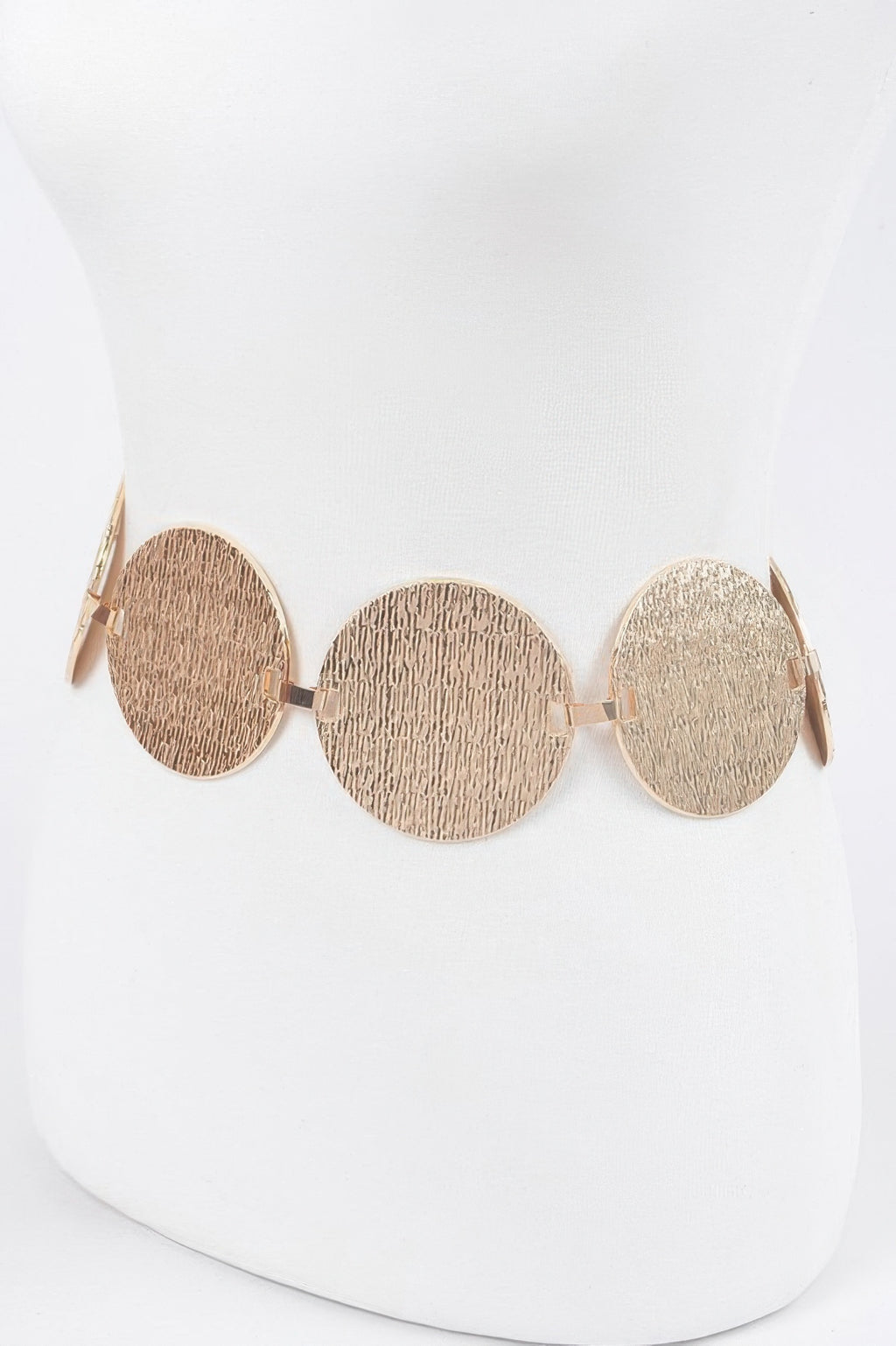 Gold circular plated belt on mannequin: textured round discs with clasps