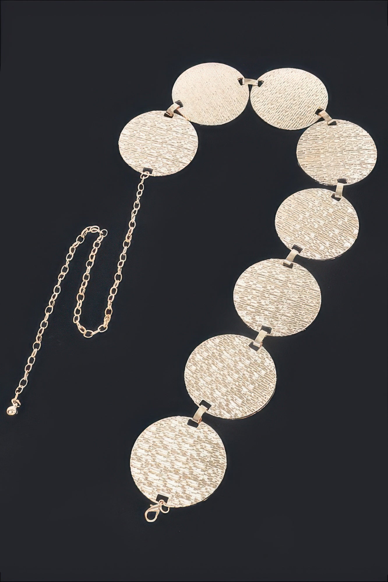 Gold circular plated belt with textured round discs connected by chain links