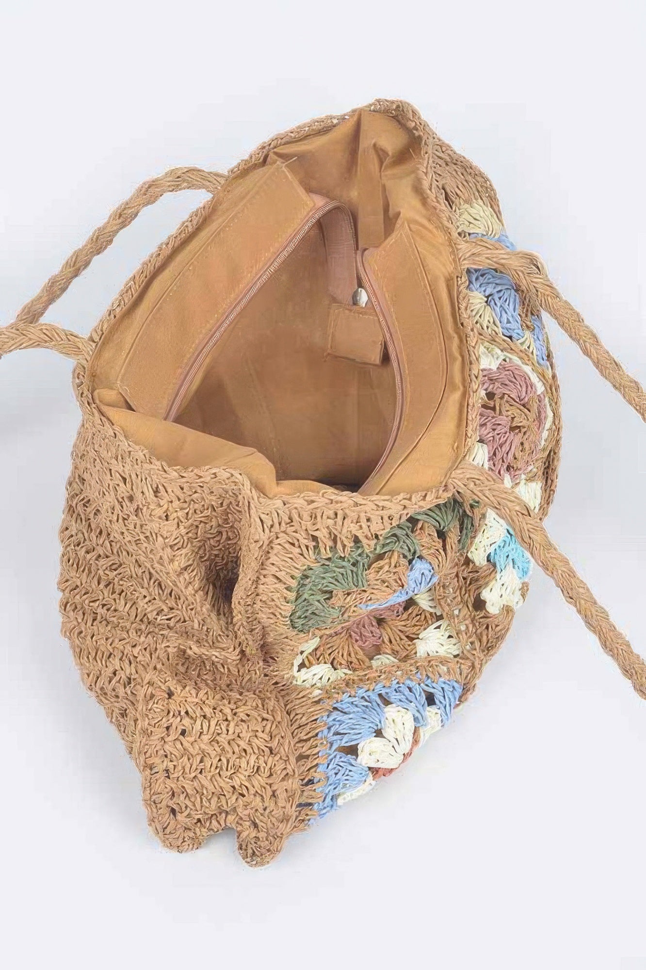 Faux straw tote bag open top with beige lining and crocheted exterior