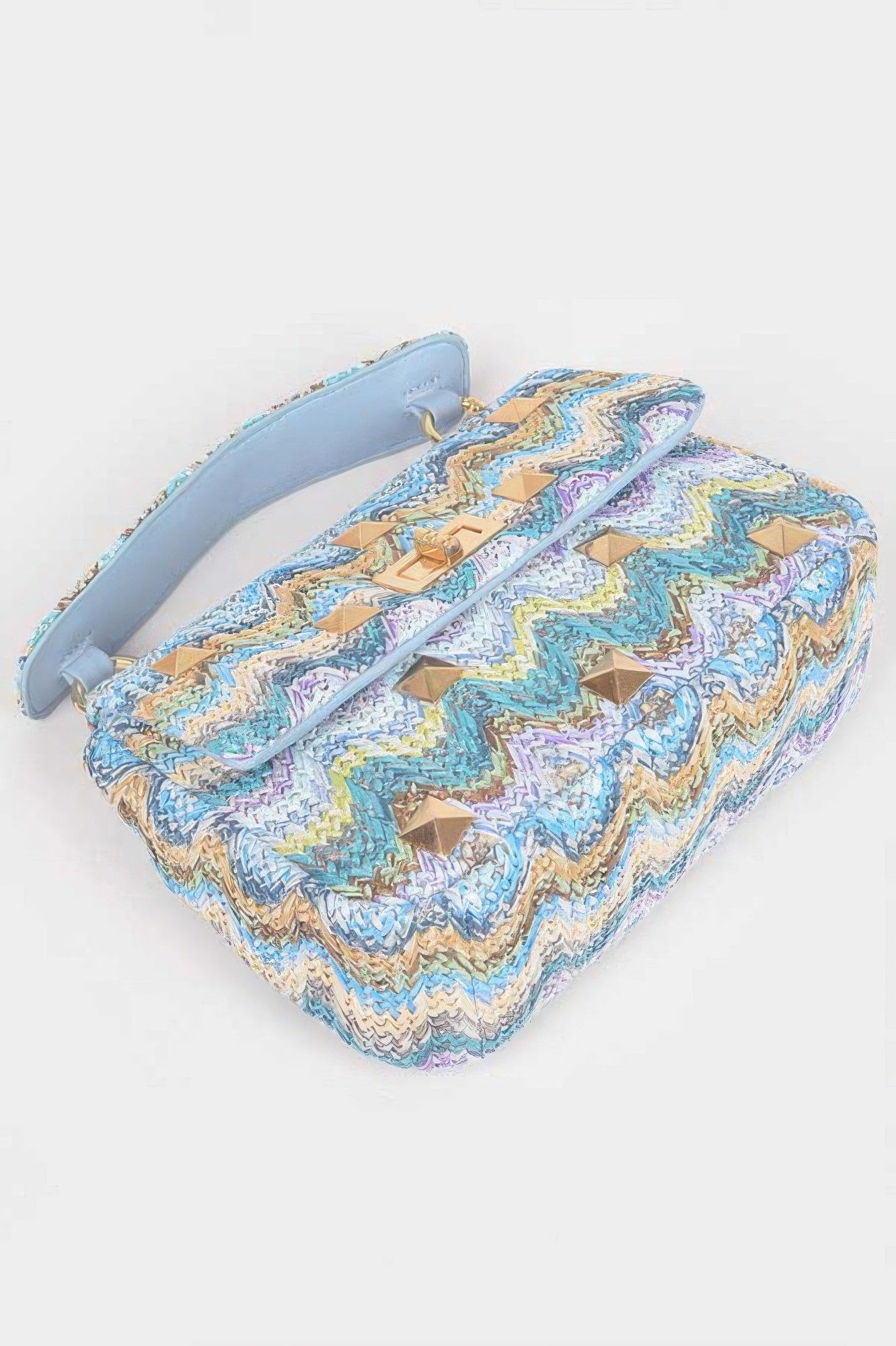 Faux straw flap top-handle bag, blue chevron pattern with gold studs and light-blue strap