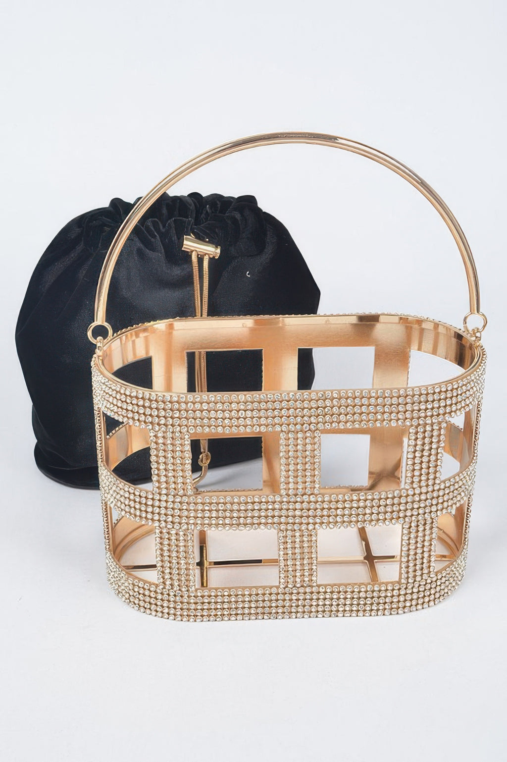 Gold-toned rhinestone frame clutch with black satin drawstring top and metal handle