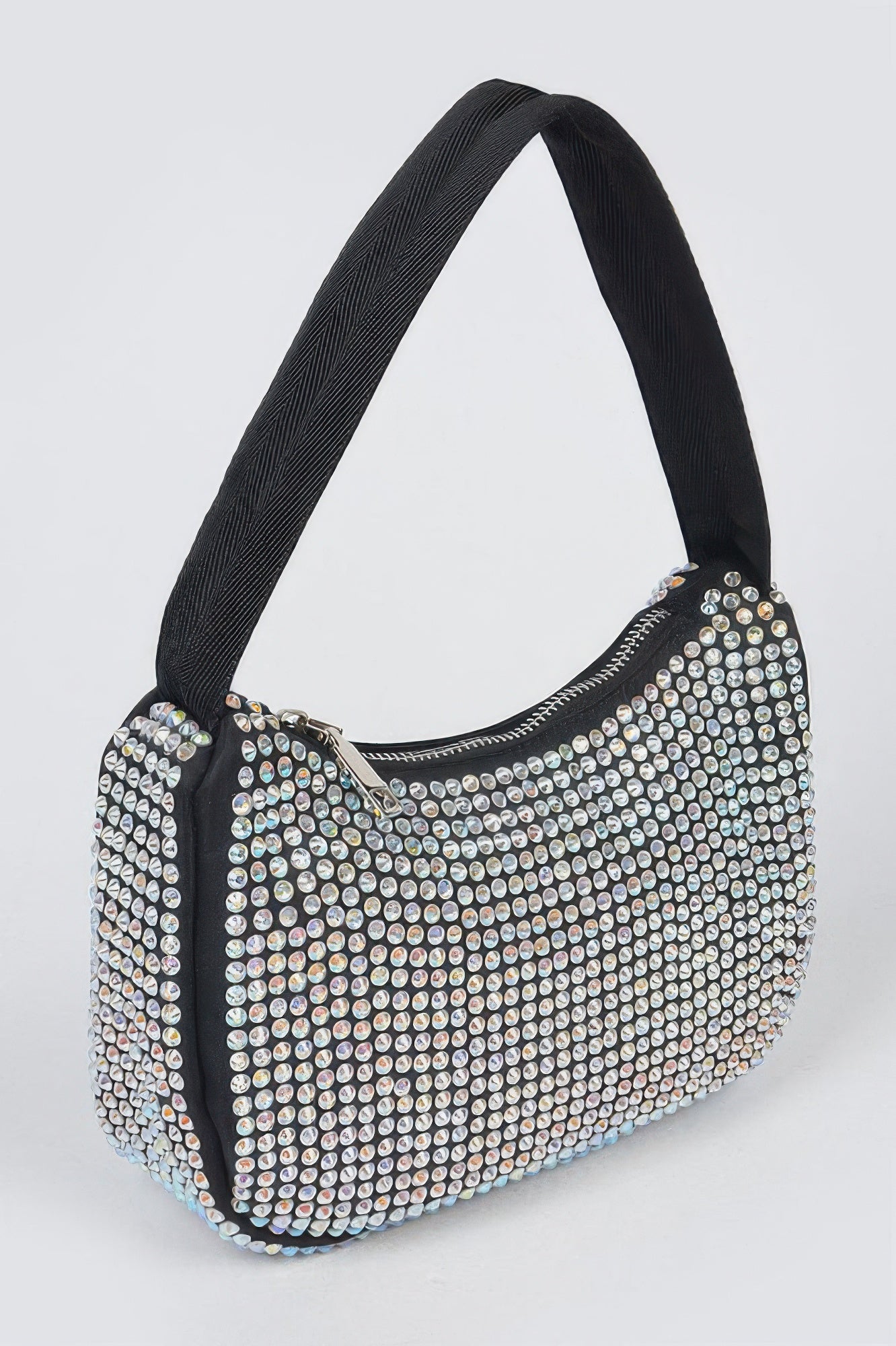 Black rhinestone shoulder bag, side angle with zipper trim and attached charm