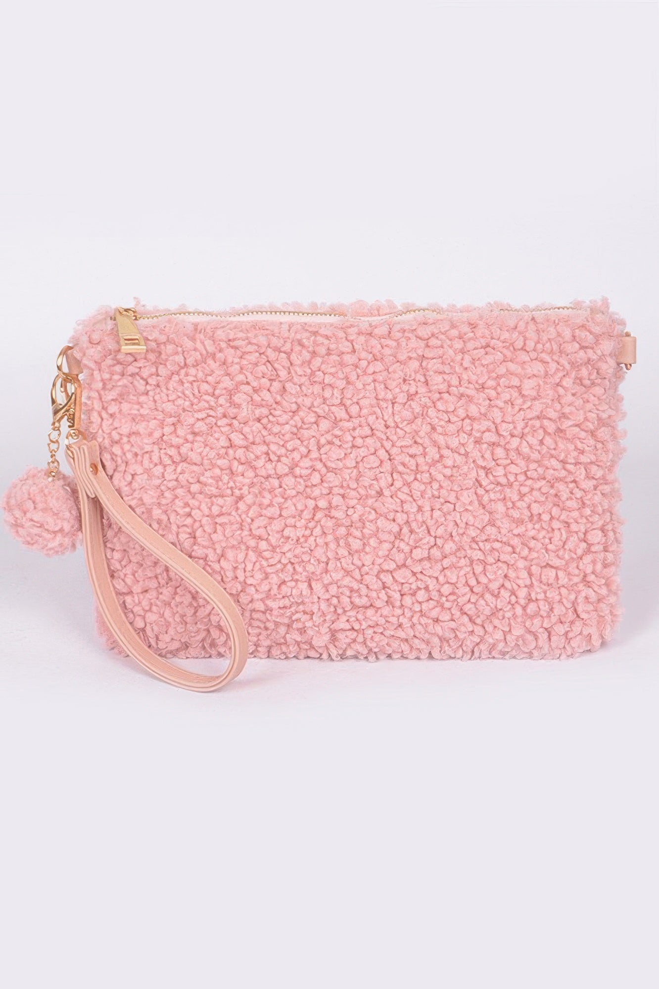 Dark pink faux fur clutch with zipper top, wrist strap, and pom-pom keychain