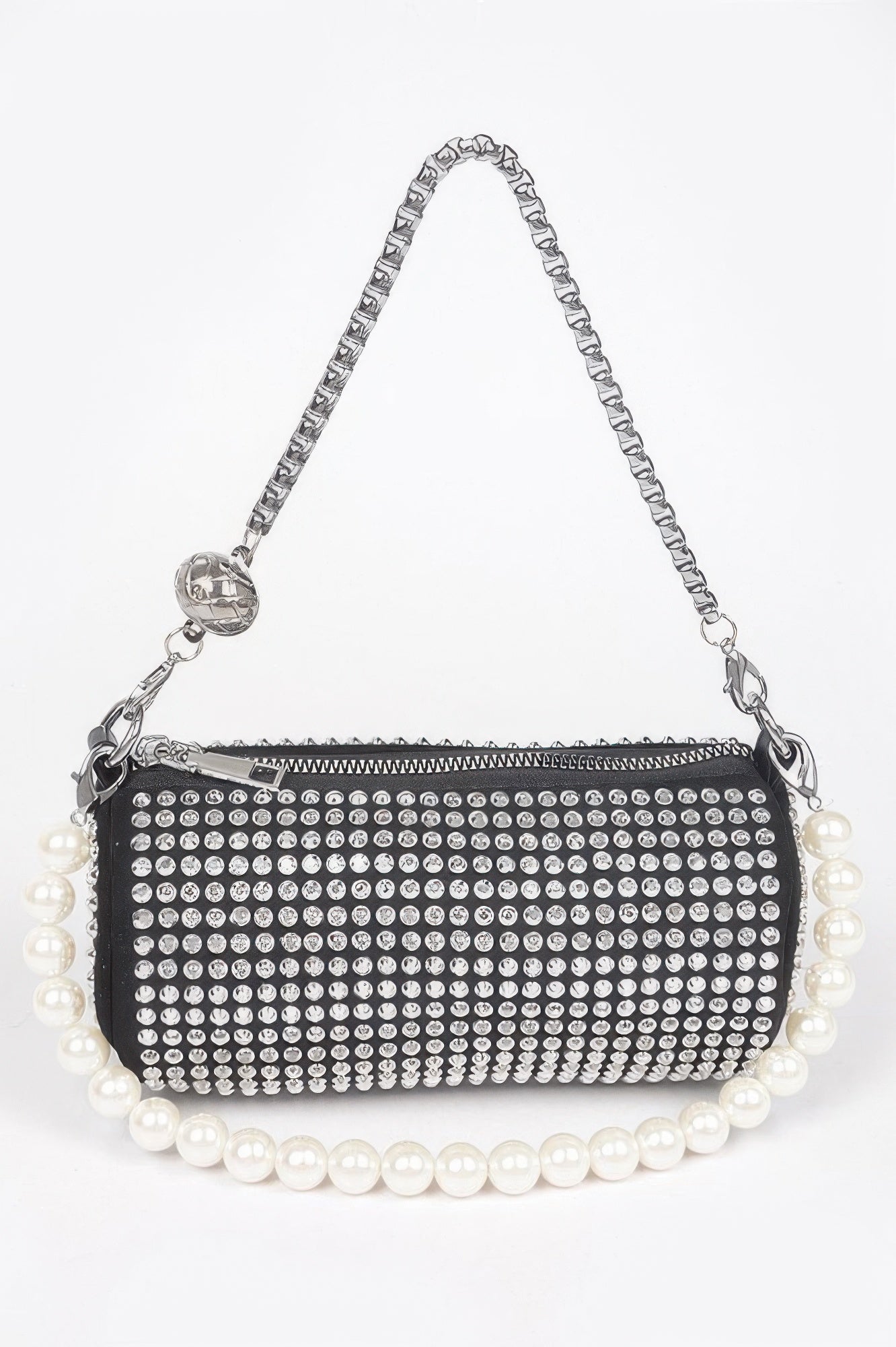 Black rhinestone tube bag with pearl top handle and silver chain crossbody strap.