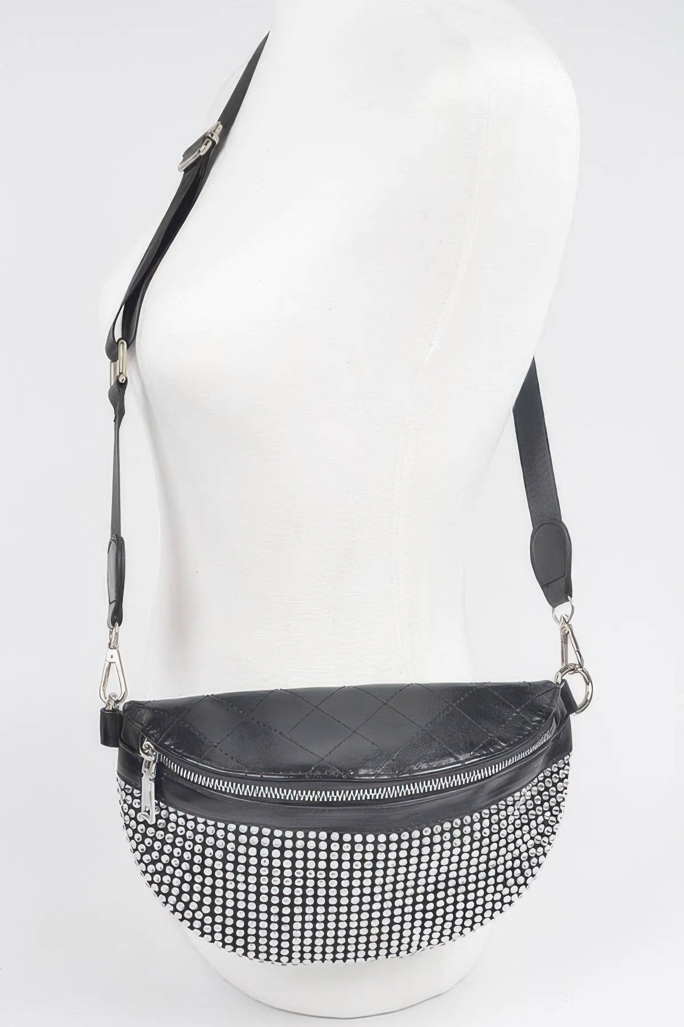 Black rhinestone fanny pack with arched quilted flap, front zipper and adjustable strap