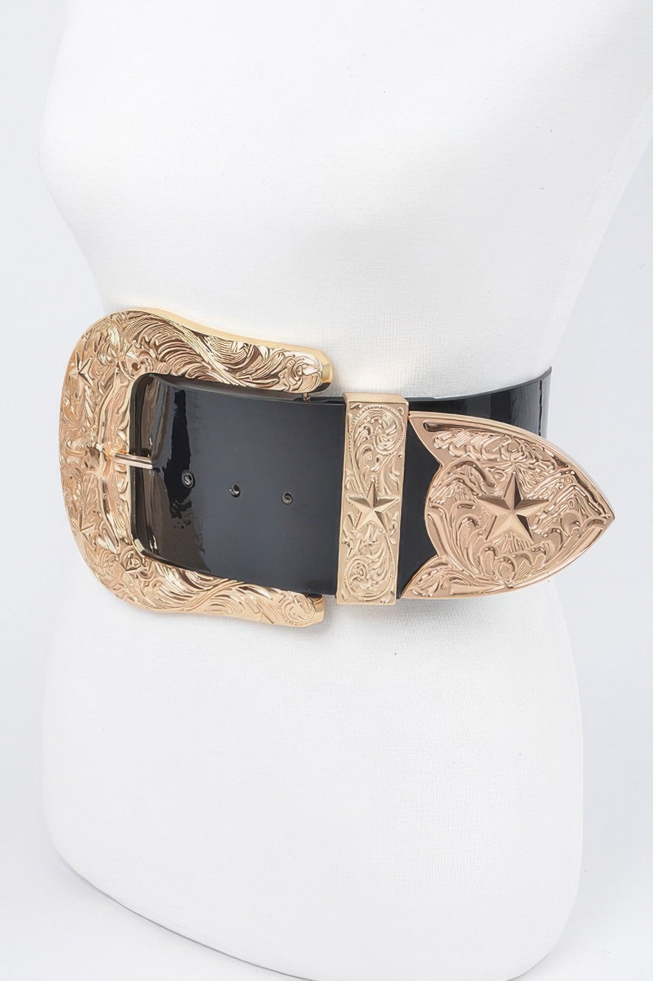 Oversized waist belt with gold engraved frame, black panel buckle and dark strap