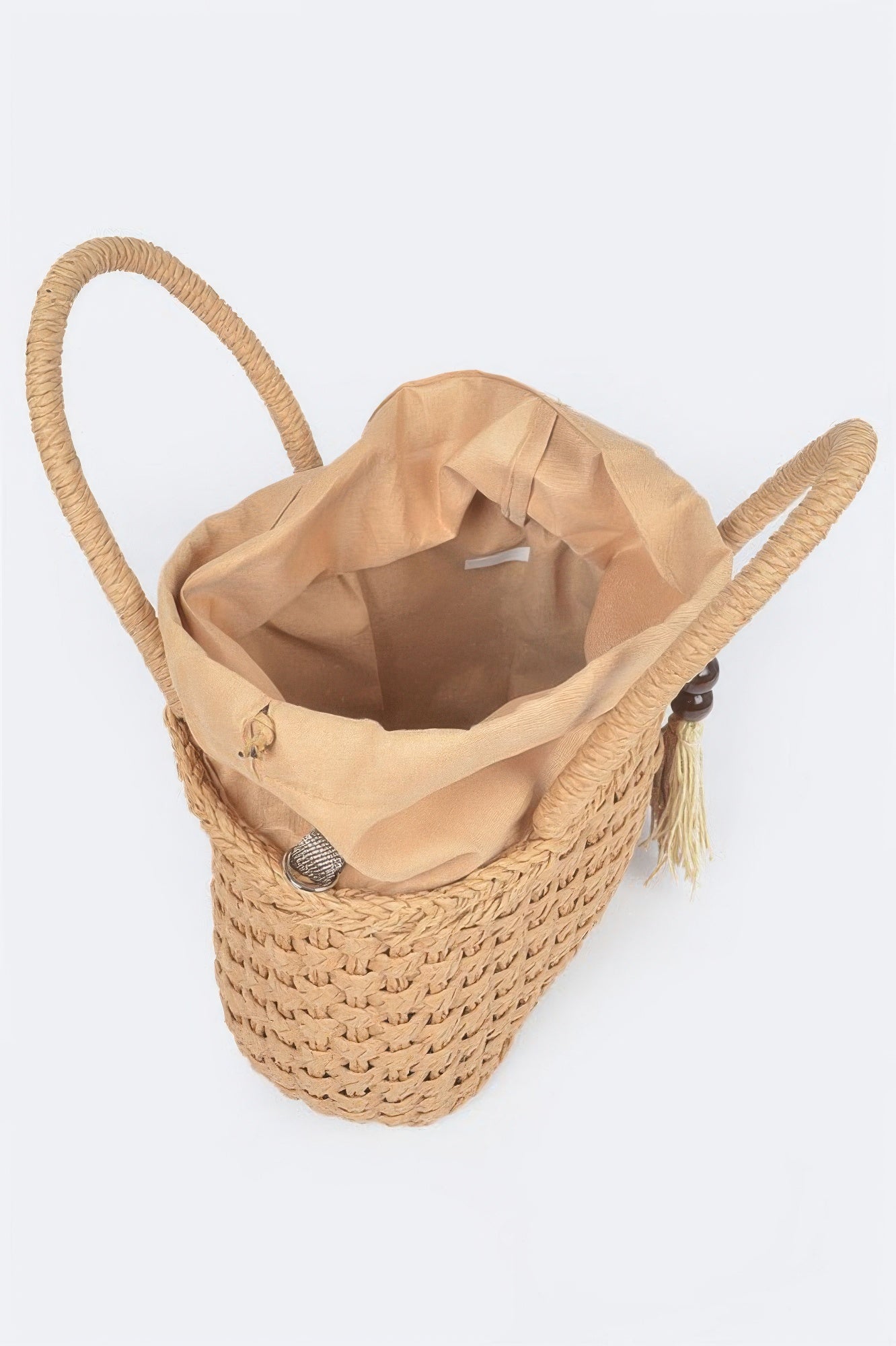 Khaki faux straw tote bag opened view with fabric lining, woven sides and tassel charm