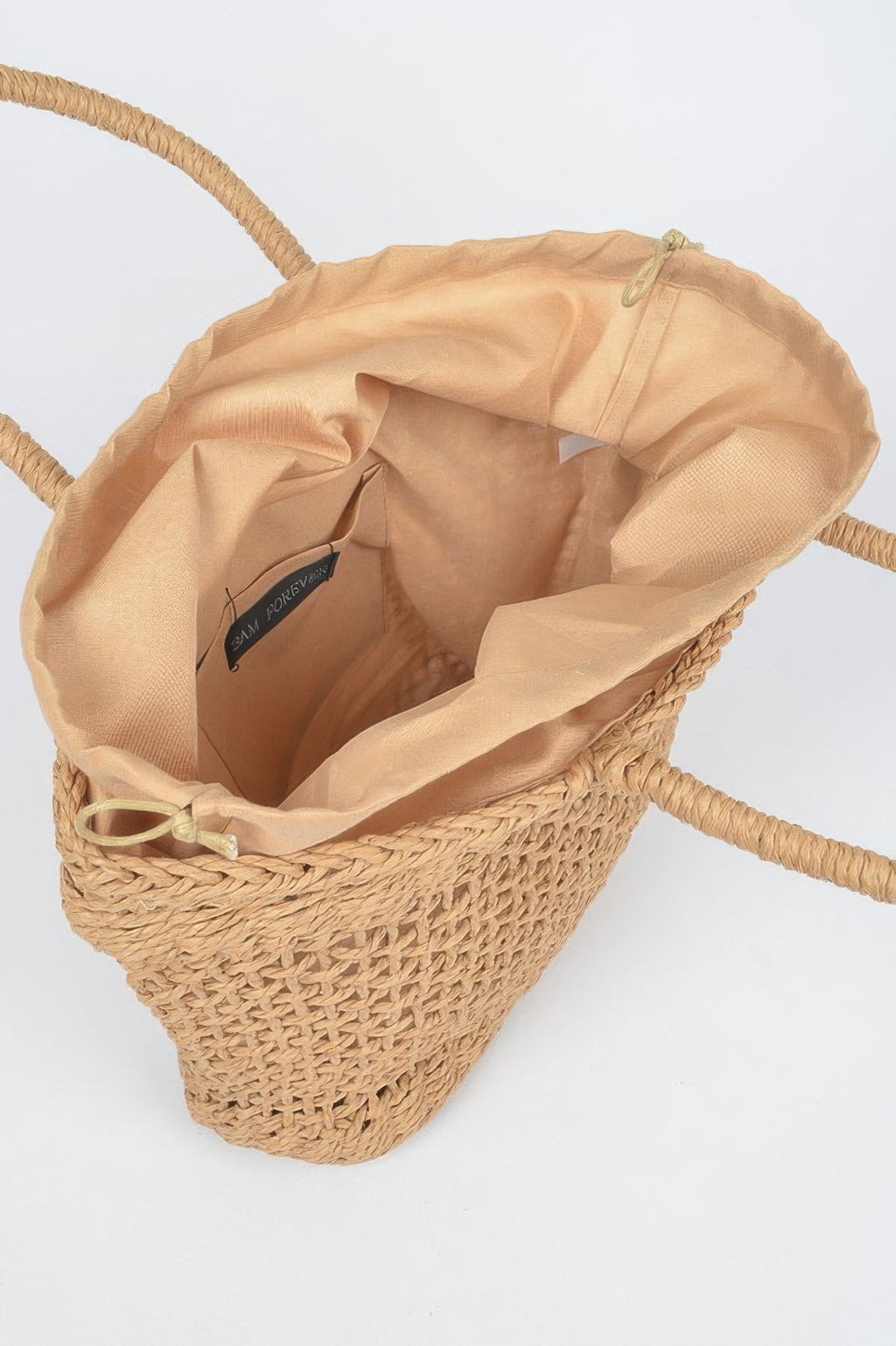 Khaki tote bag interior view with fabric lining, drawstring and woven sides.