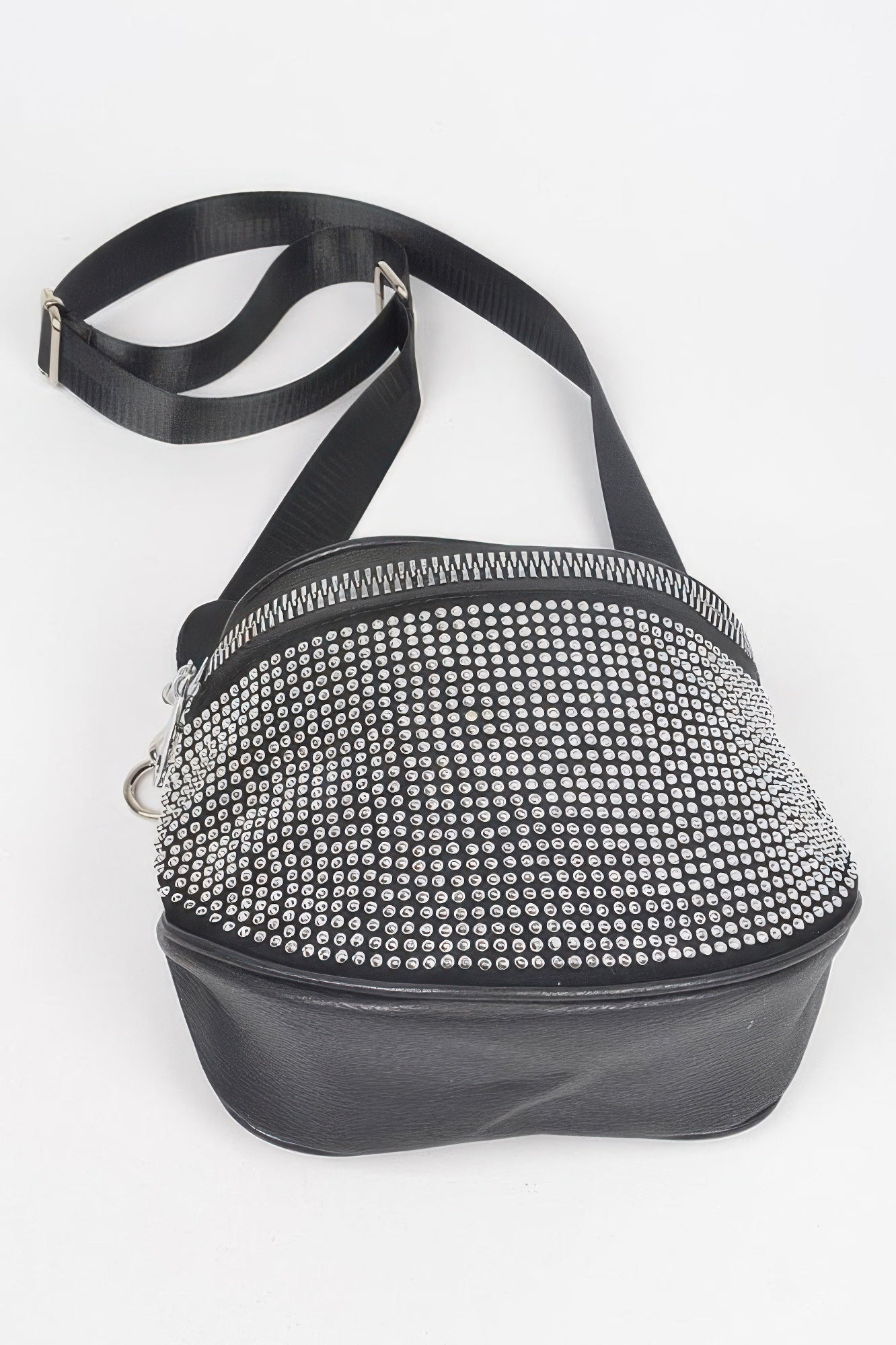 Stone-studded crossbody bag with long strap, silver dot front and rounded top