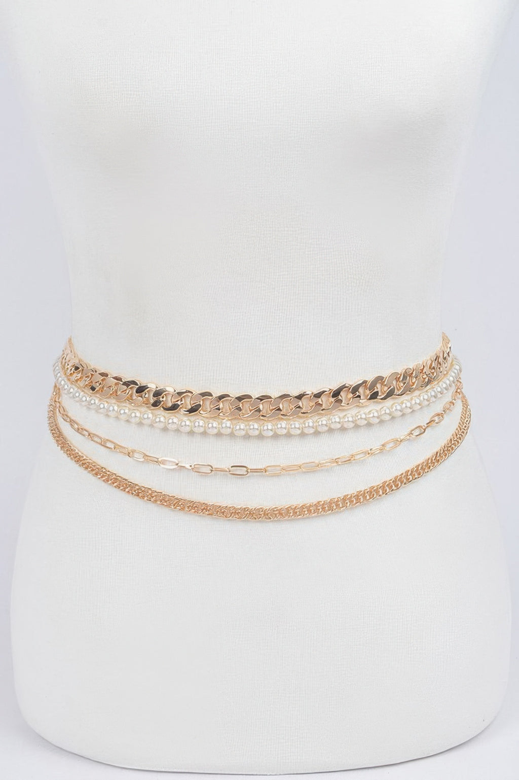Multi Layer Chain Belt in gold tones with pearl-accented links on a draped band
