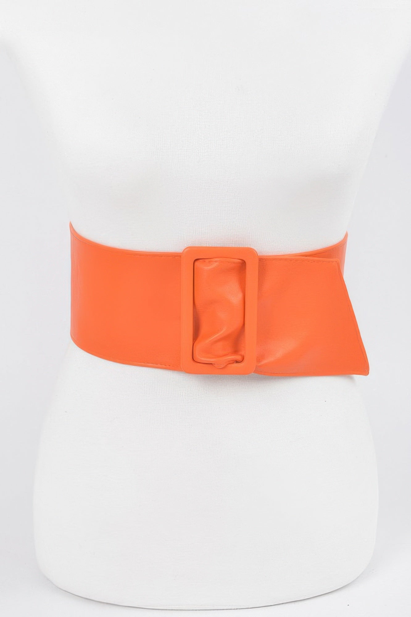Faux leather waist belt, orange, wide strap with square buckle and angled end.
