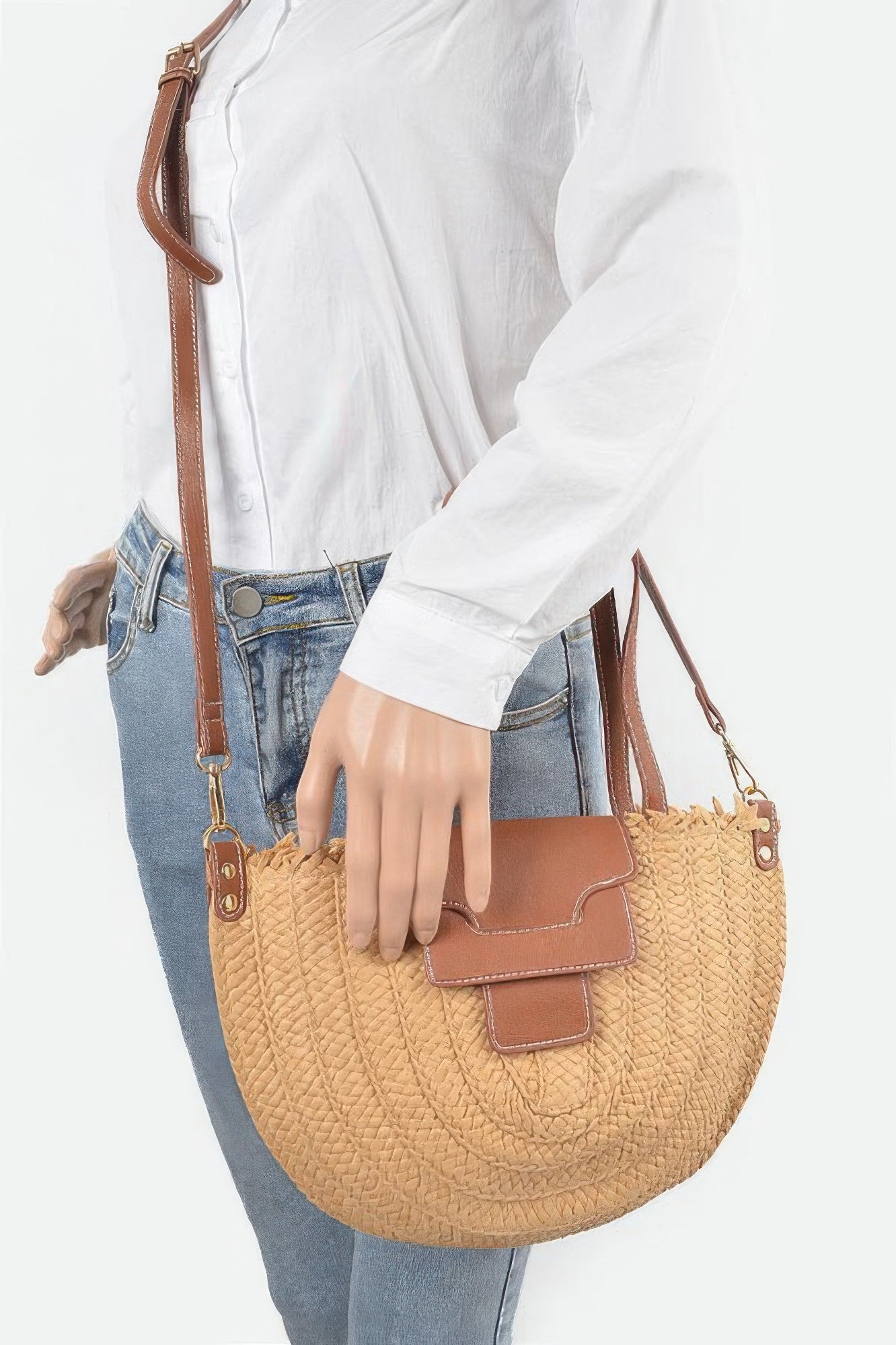 Faux straw crossbody bag on model, khaki woven body with crossbody strap and front flap