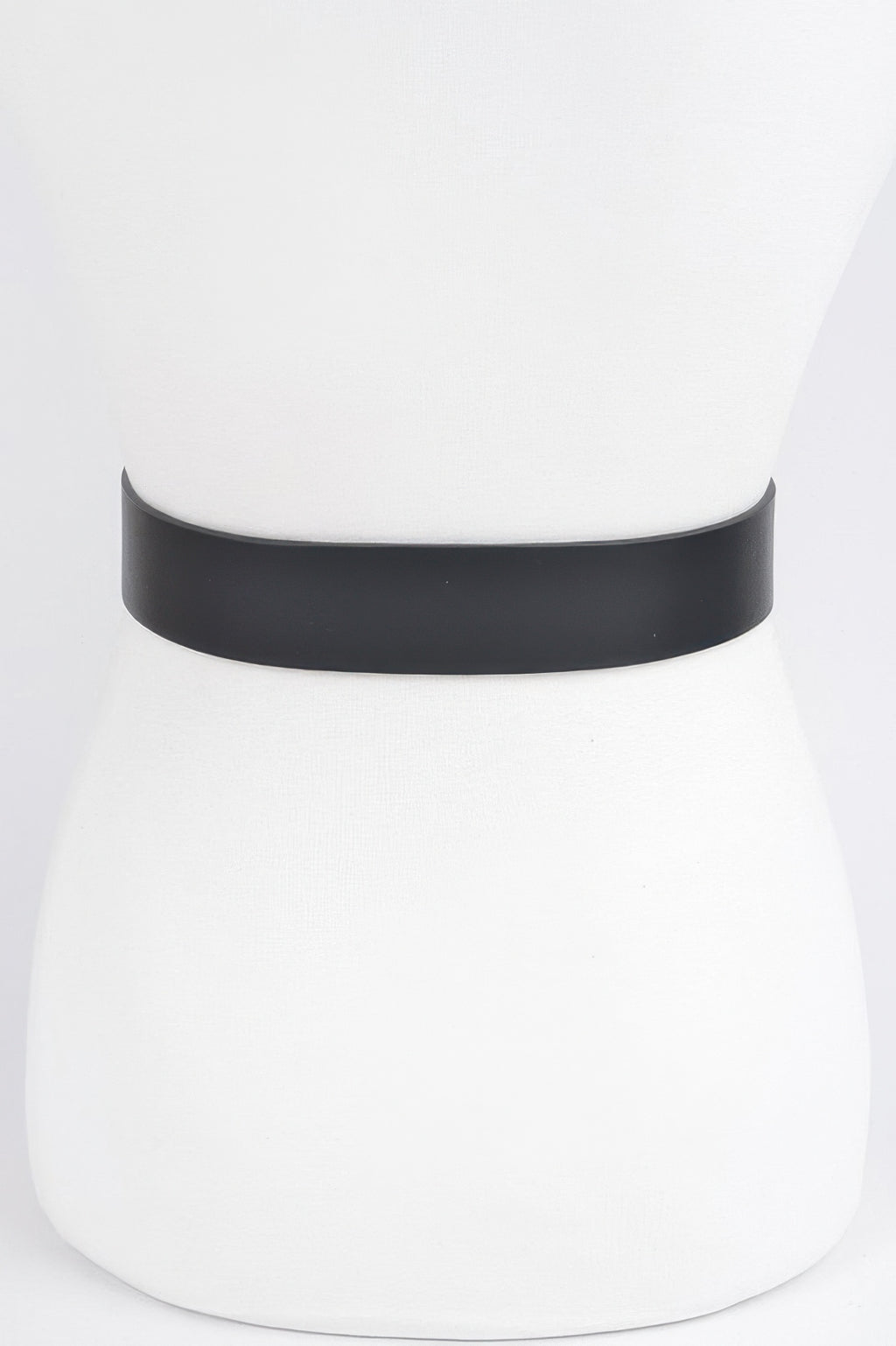 Black faux leather belt, plain band view without buckle or studs