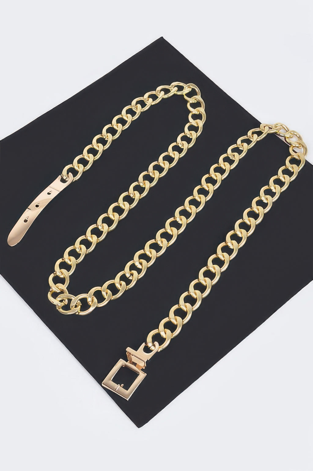 Gold chain belt with square buckle clasp and long dangling end