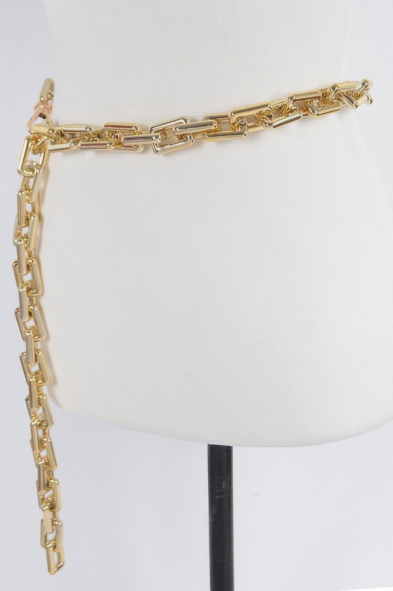 Gold link chain belt with long strap and end clasp detail