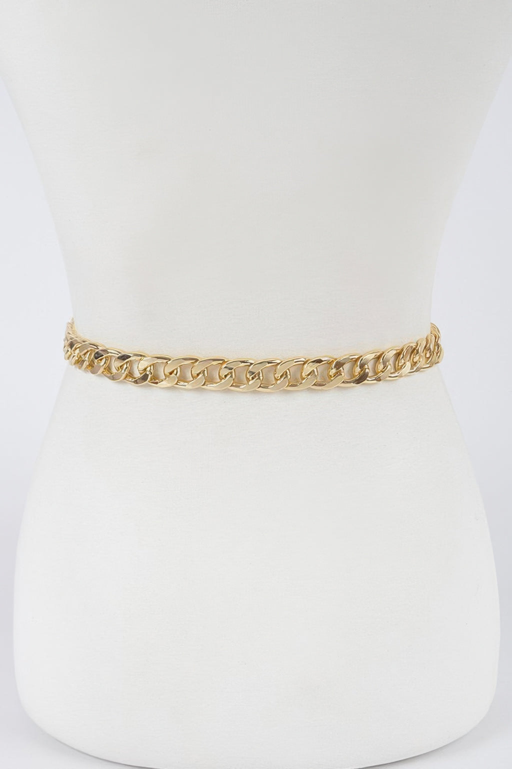 Gold chain belt on mannequin, no buckle shown