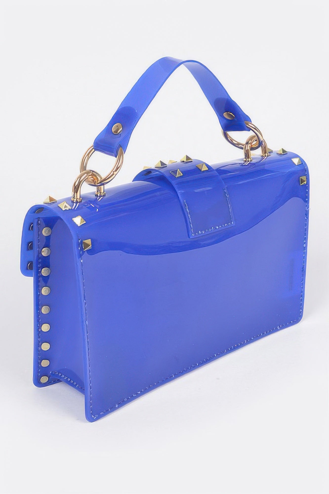 Cobalt transparent clutch with top handle, gold stud trim, and front flap closure