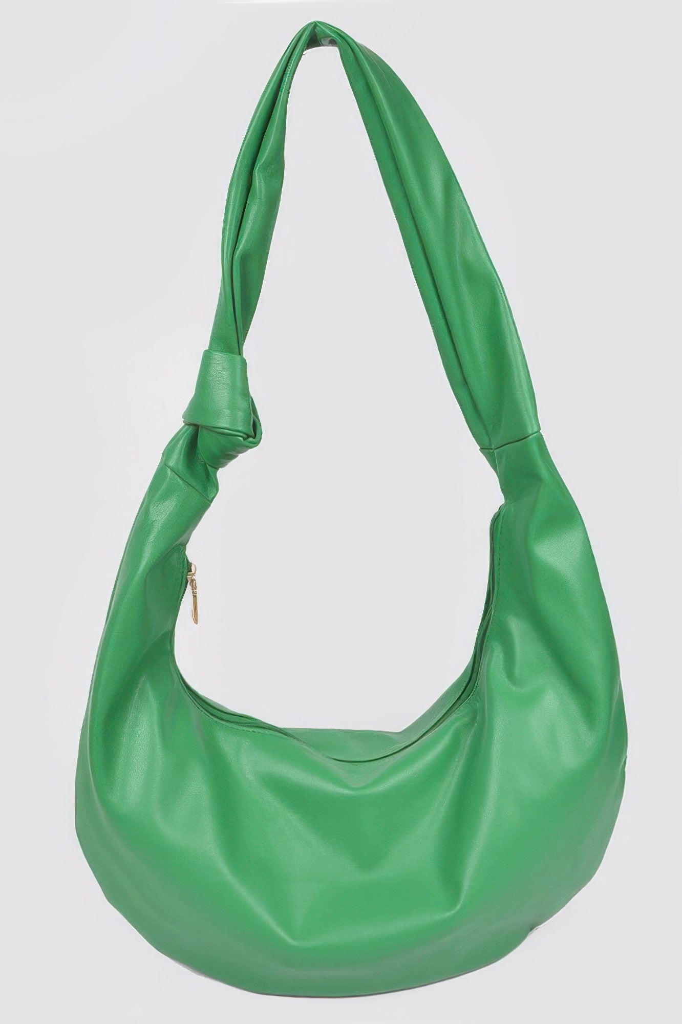 Green faux leather hobo bag with long handles and curved slouchy silhouette