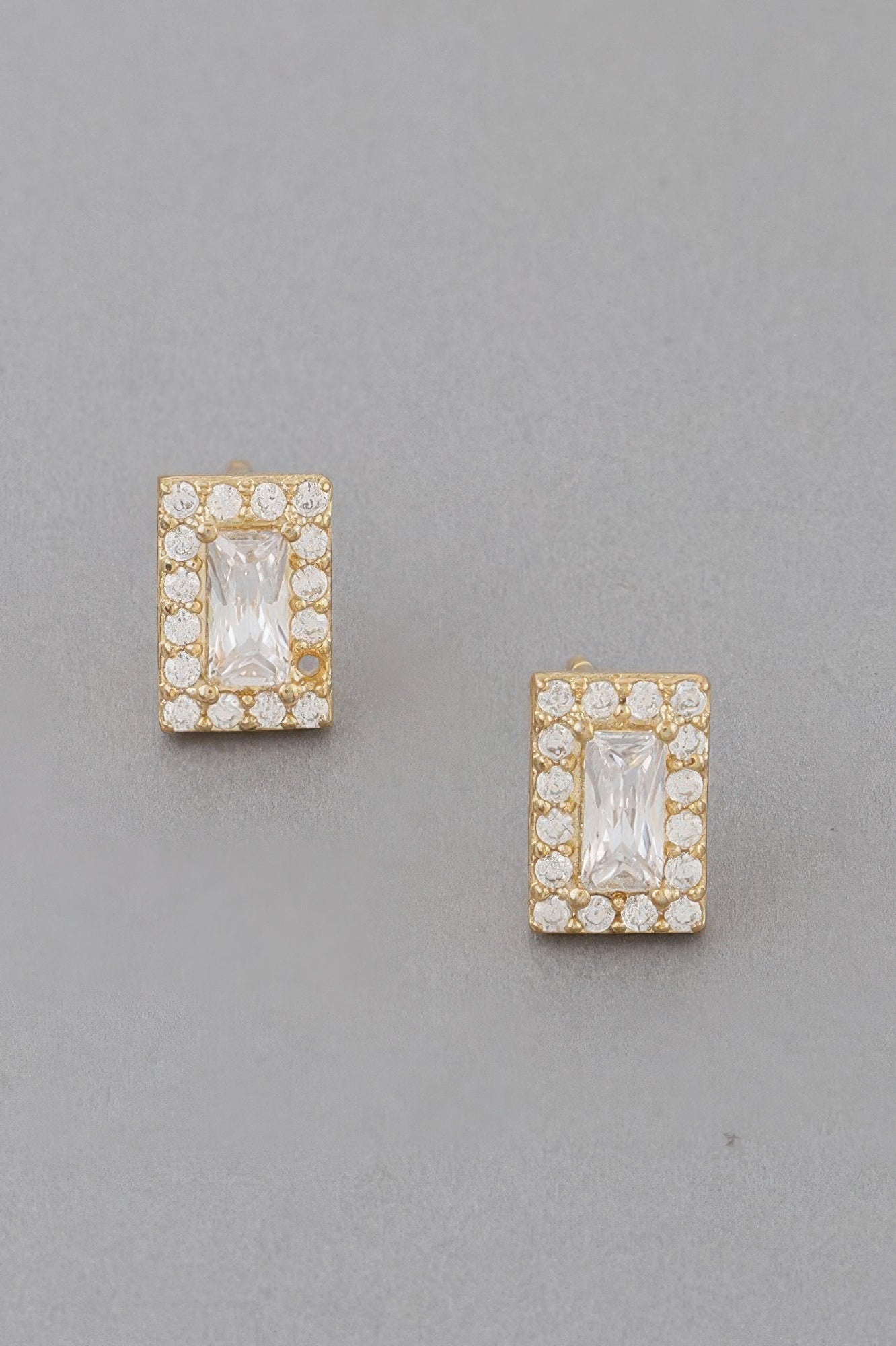 Square rhinestone stud earrings in gold with clear faceted center stones