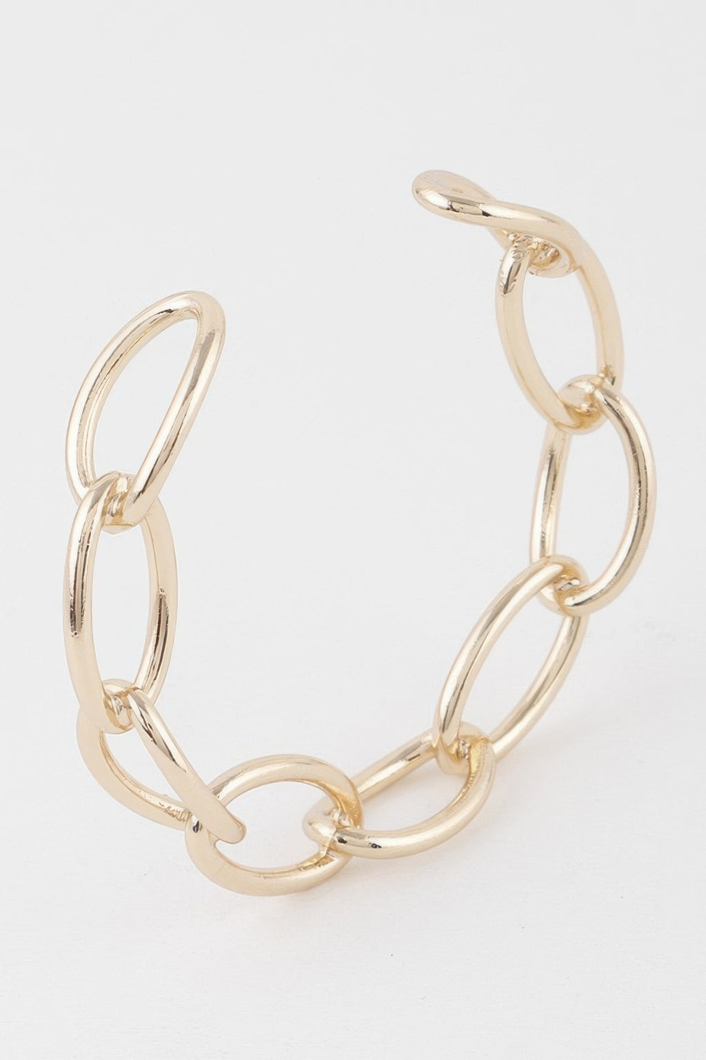 Gold link chain cuff bracelet with interlocking oval links