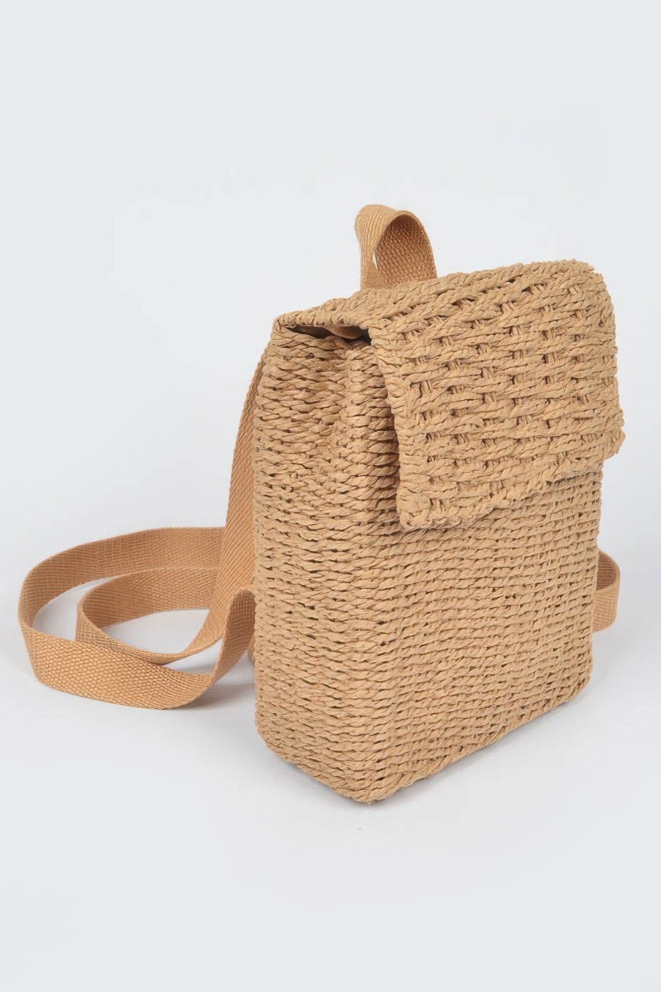 Khaki woven mini backpack with open top and adjustable shoulder strap, side view