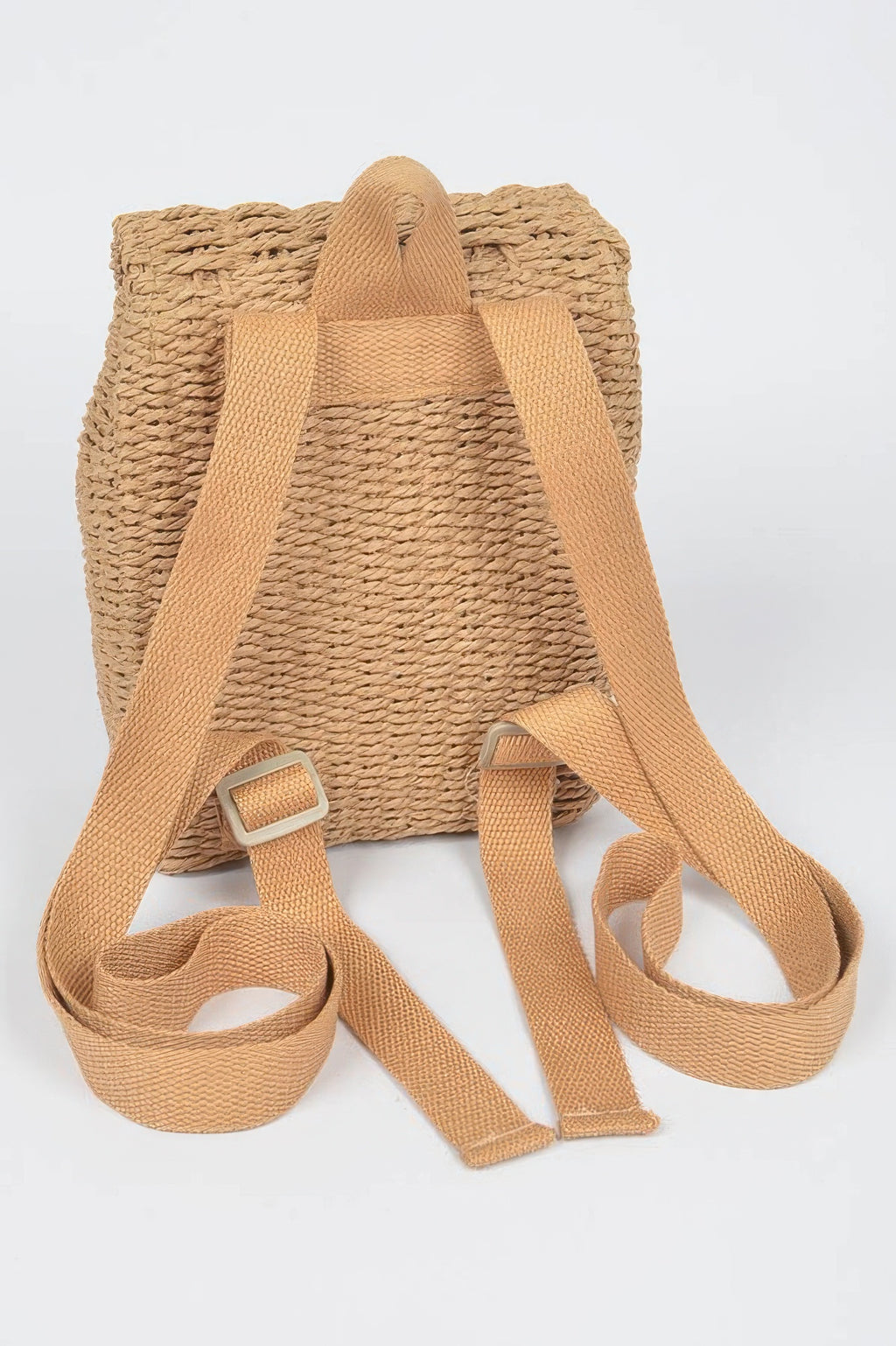 Woven mini backpack with two straps and metal buckle detail at front