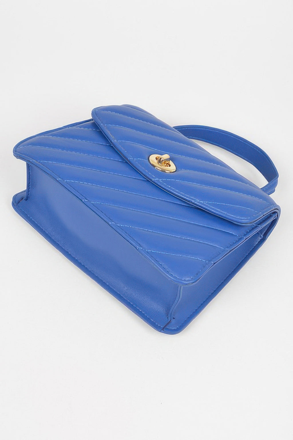 Cobalt blue quilted flap bag, folded top and gold clasp detail