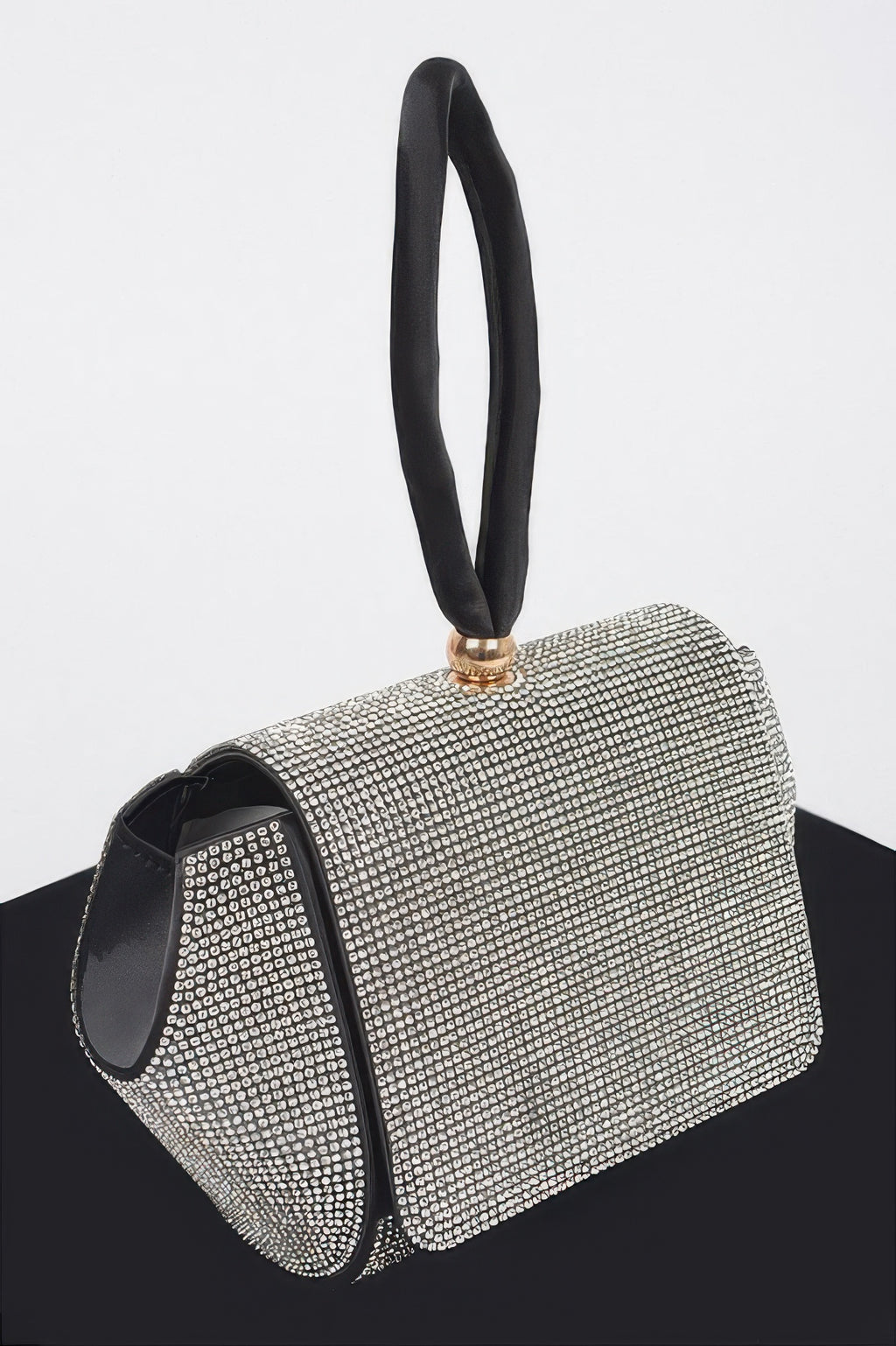 Rhinestone flap clutch with black edging and top handle strap
