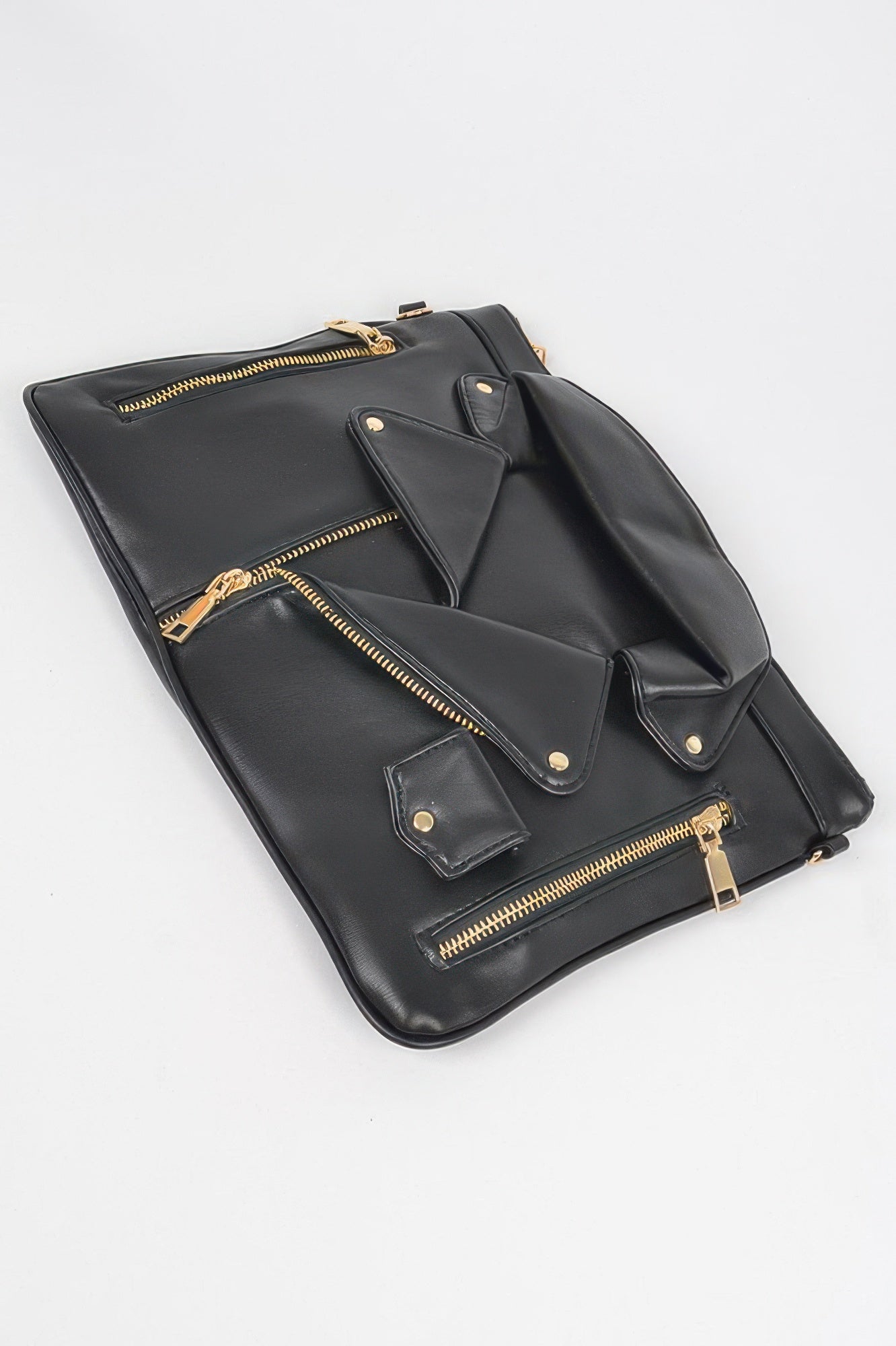 Black faux leather novelty bag, multiple zip pockets and gold trim, top closure
