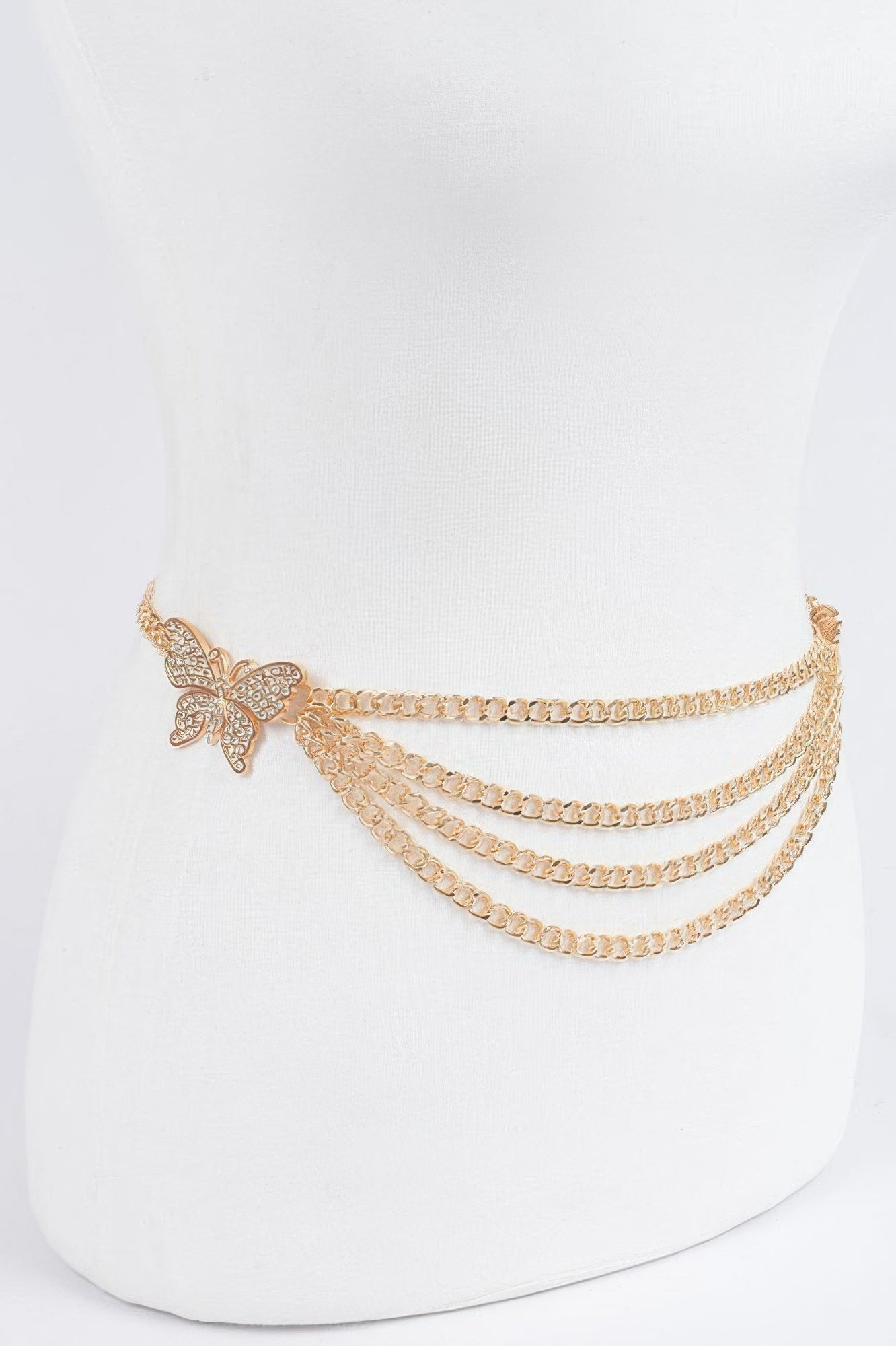 Gold chain belt with butterfly buckle and three cascading chain layers
