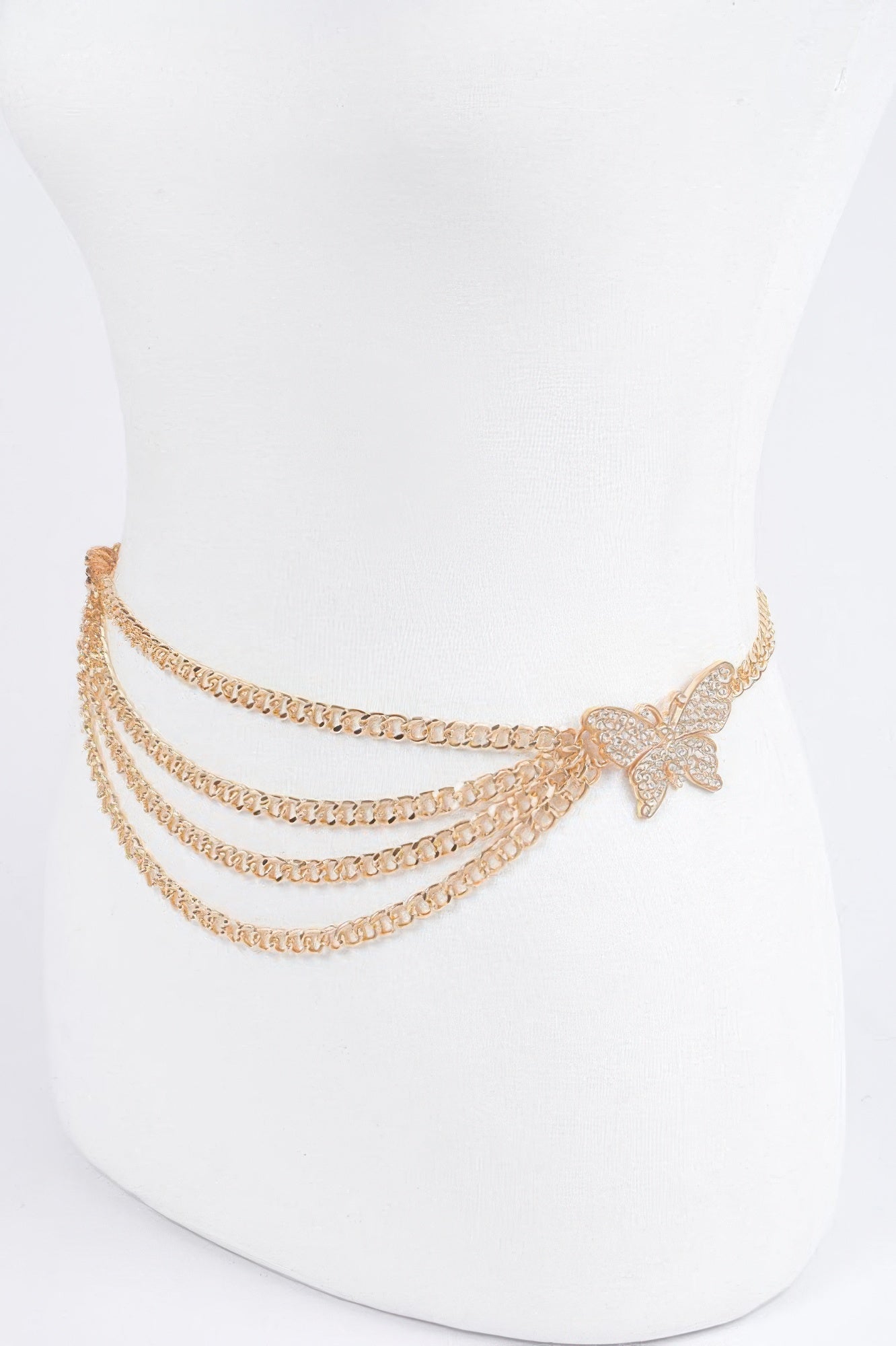 Gold butterfly buckle layered chain belt on waist form, side view