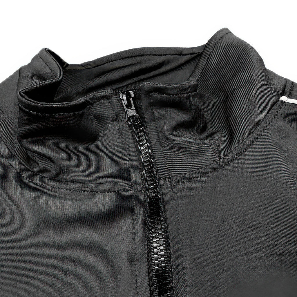 Black track jacket close-up: stand collar and full-length zip with textured pull
