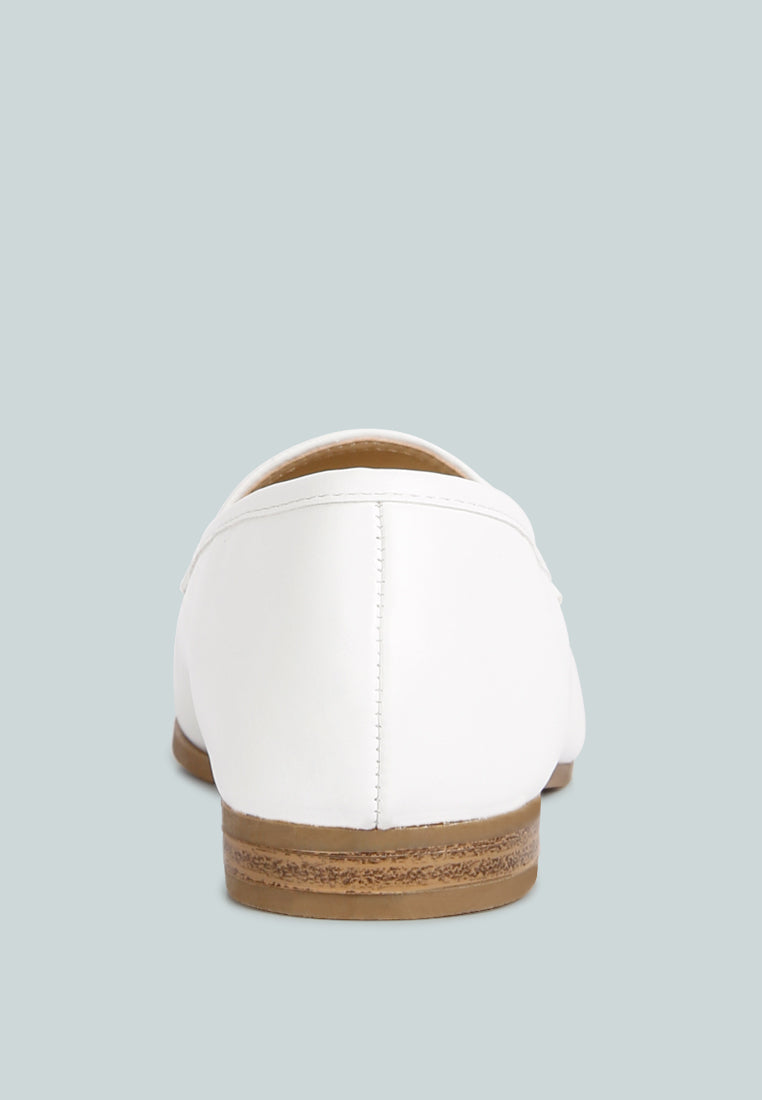 White faux suede loafer, back view with low stacked heel and seam details