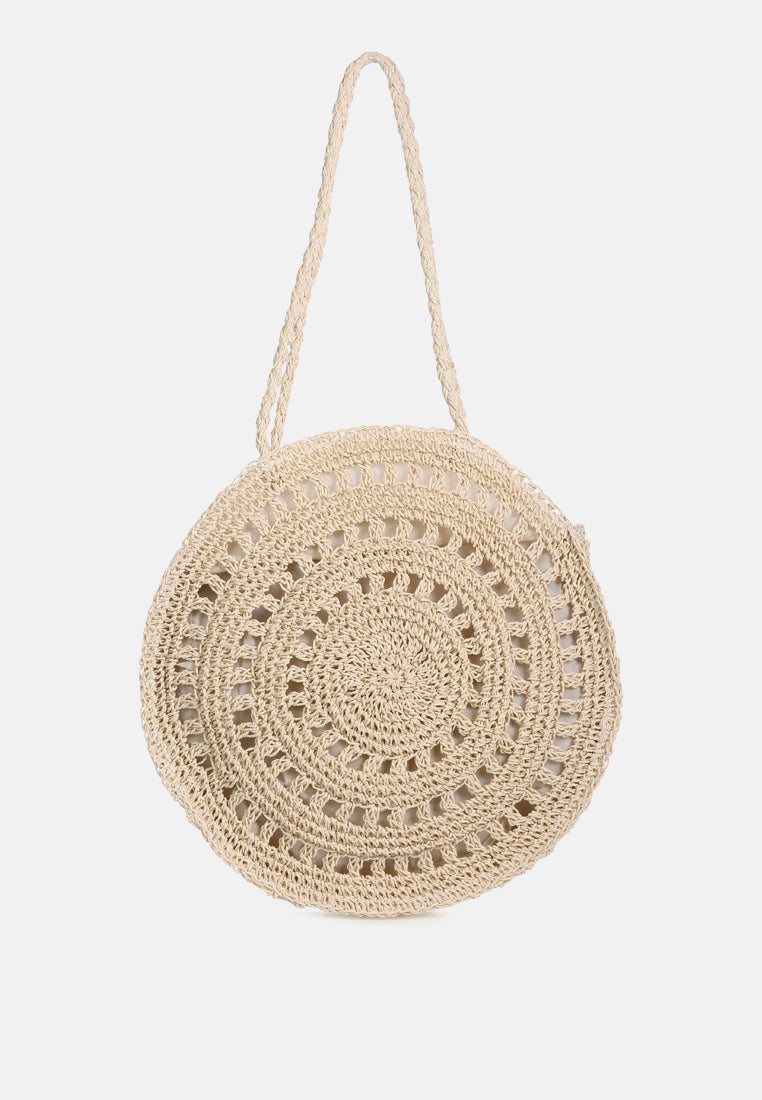 Beige round crochet paper bag with circular pattern and long handles