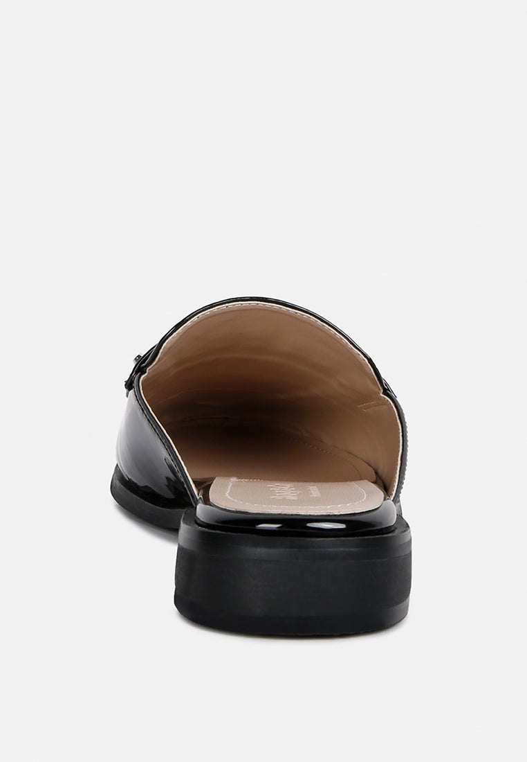 Black patent flat mule heel view, open slide with cushioned interior