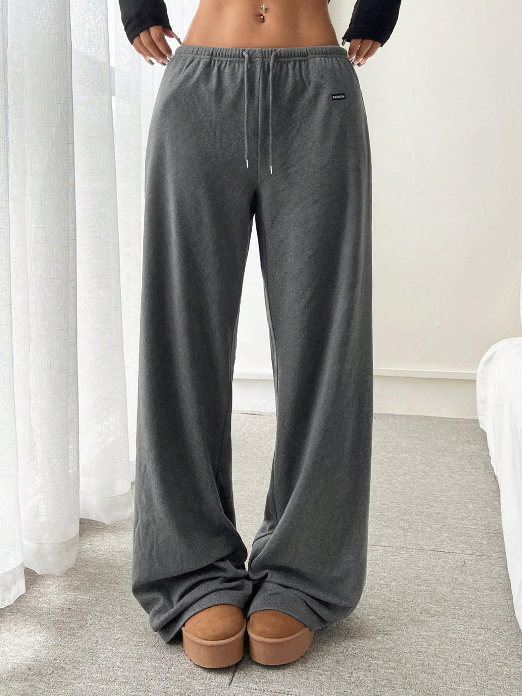 Relaxed drawstring pants in gray, elastic waistband and wide straight legs