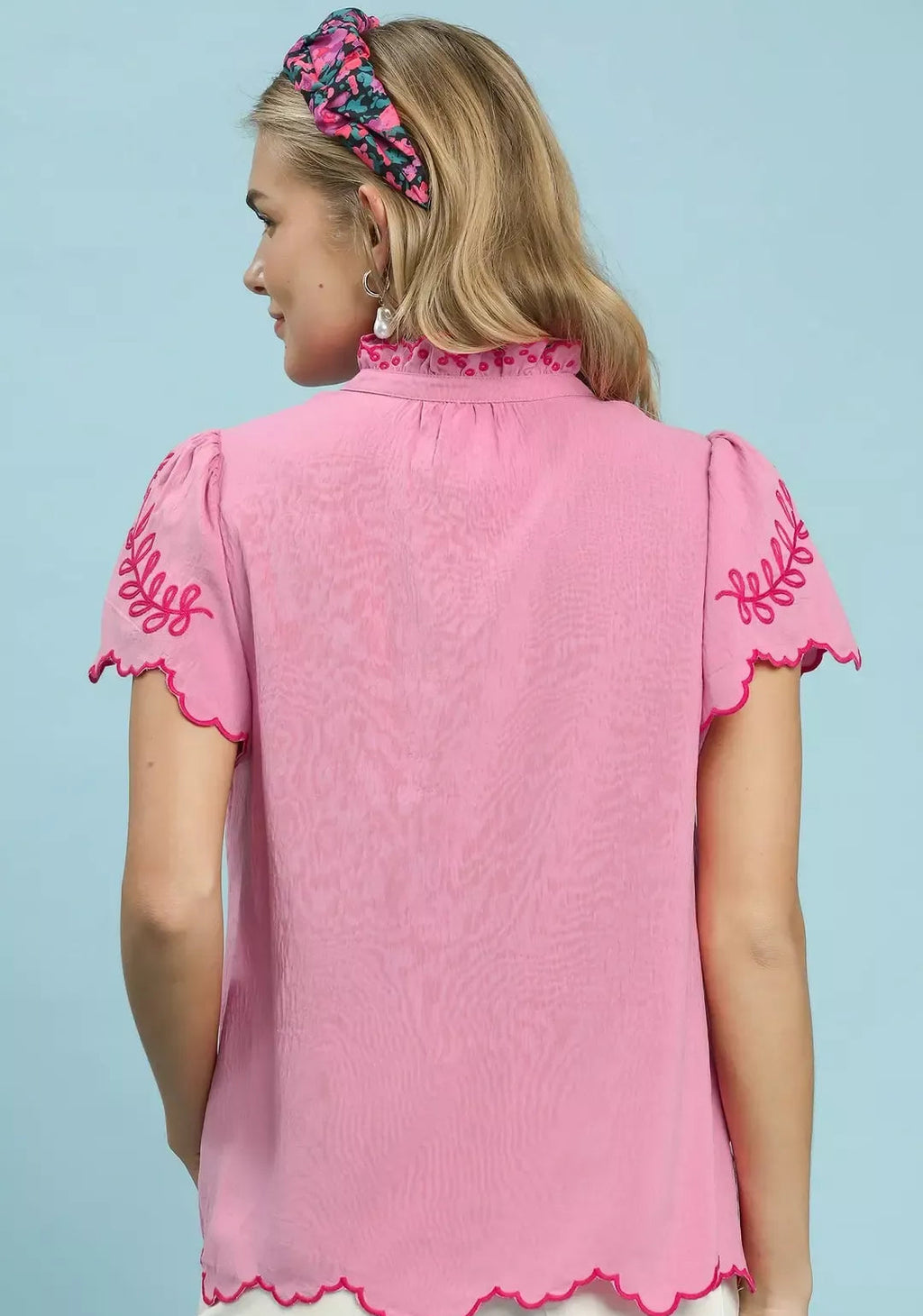 Pink embroidered back top with scalloped hem and short puff sleeves