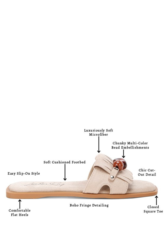 Beige microfiber flat sandal: closed square toe, bead cluster and fringe front