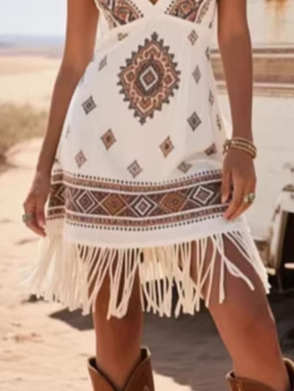 White mini dress with central diamond print and layered tassel fringe