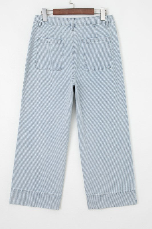 Sky blue stripe wide-leg jeans flat lay showing straight wide leg and patch pockets