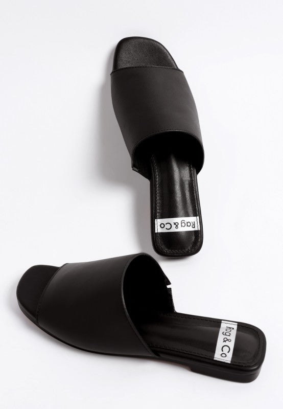 Black leather slide flats, open toe with cushioned footbed and wide strap