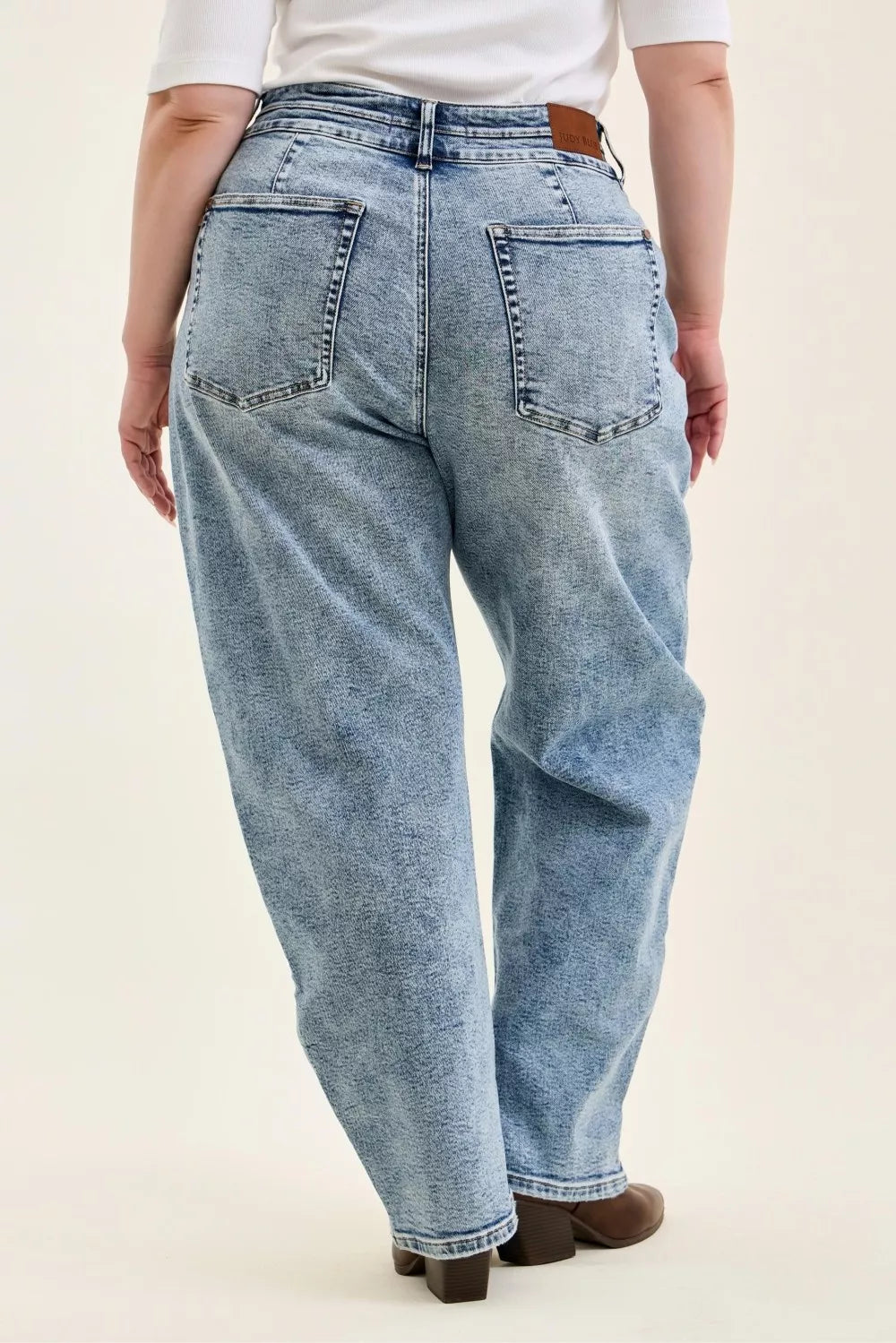 Light Blue high-waist jeans front view with double waistband and front patch pockets