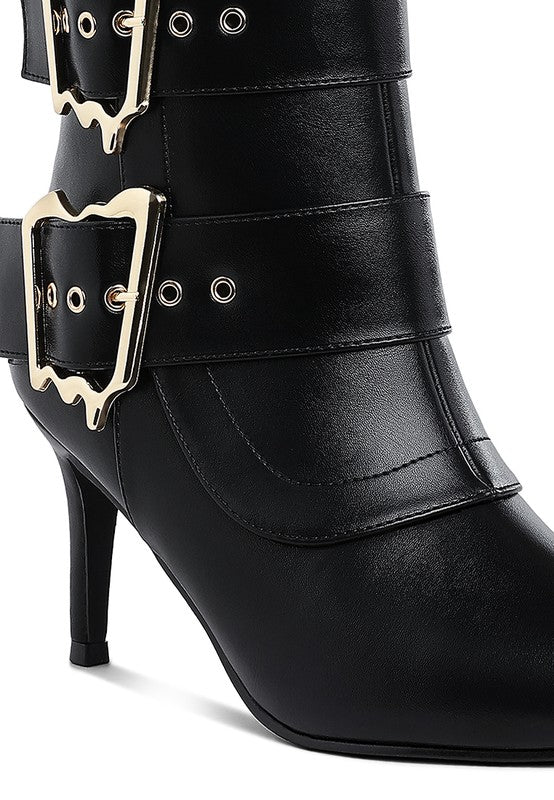 Black ankle boots side view with double buckle straps and sleek slim heel
