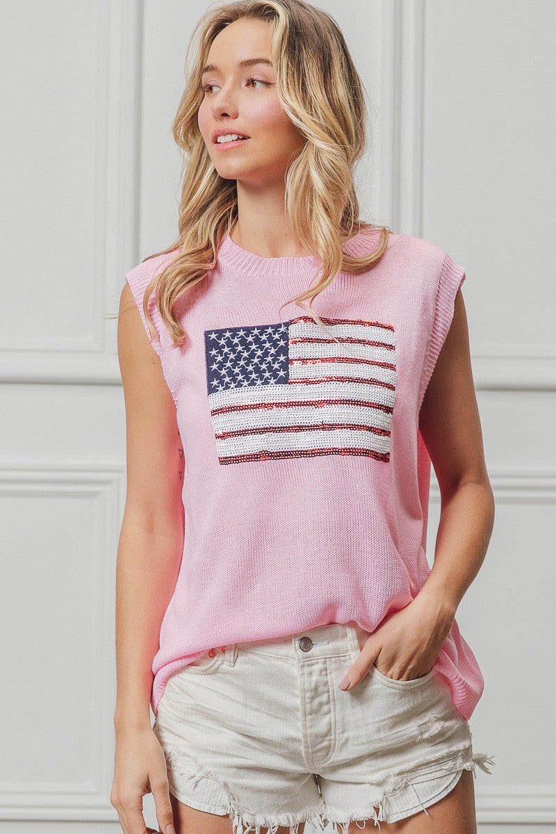 Pink sleeveless knit top with American flag sequin patch on front