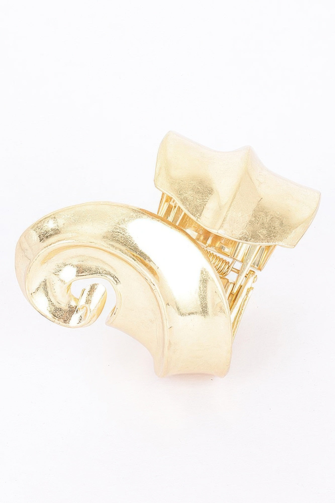 Gold cuff bracelet with open hinge, rounded clasp disc and glossy finish