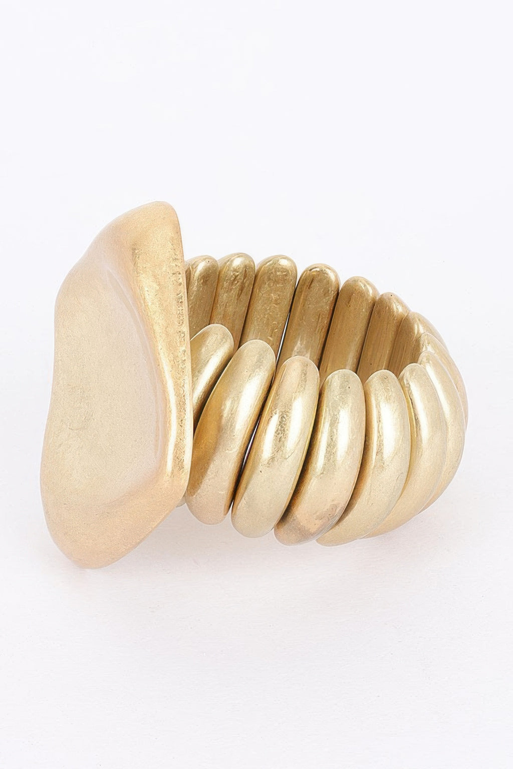 Gold alloy stretch bracelet with oversized oval end and ridged bead segments